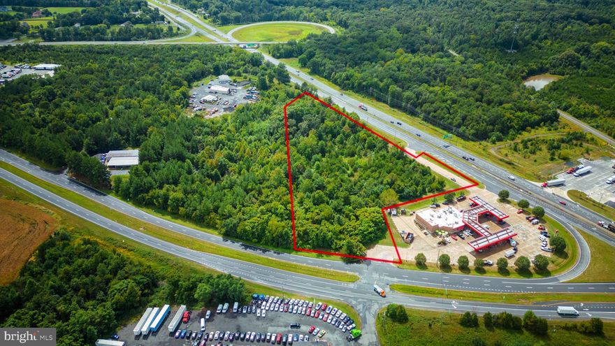 Prime Location for a variety of commercial uses.  
Visibility on Route 15/29 at the Route 17 Interchange, as well as from Rt 17 (Marsh Rd) .  
6.3 Acres, zoned Industrial Park (I-1)
Future Land Use called for is Mixed Commercial/Light Industrial.     

Buyer will need to register site plan and follow County Permit process depending upon plans.   Sellers do not possess a survey.  
Sewer is present nearby.   Wells exist nearby, however, well test will need to be performed by Buyer as part of due diligence
Signage potentially visible on Rt 15/29 and/or Rt 17.
Turn Lane and Entrance exists off of Rt 15/29 Northbound.
I-1 Zoning supports many industrial and commercial uses
More than 26,000 ATD
Buyer or Buyer's Agent to verify all utilities with service providers.
