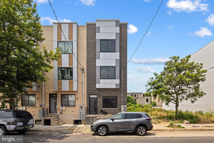 ### AN ENORMOUS  CONDO IN THE MOST GROWING NEIGHBORHOOD OF PHILADELPHIA###  A FULL 8 YEARS TAX ABATEMENT LEFT###  1000 Sqft Of Living space and 1000 Sqft of Outdoor space!!!!  This property located around many new constructions on the block and the surrounding blocks.  Walk in to your beautiful and big  3rd floor unit that features 3 large bedrooms and 3 full bathrooms, high ceiling, recessed lights,  Berkley Interior doors, and plenty of natural light.  A modern white kitchen cabinets,  quartz countertop, a beautiful backsplash, and all stainless steel appliances  are striking finishes.  3 large bedrooms with large closets and plenty of natural light. 3 full modern bathrooms features a beautiful ceramic tile encased bathtubs, a rain shower heads, modern vanities, and a one piece modern toilets.  Your washer and dryer is Conveniently located in a hallway closet. The huge bonus of this unit and it is definitely the best part... a huge 1000 Sqft  rooftop deck with an amazing view of our beautiful Center City skyline. The imagination of how to enjoy this amazing rooftop deck i would leave for you.......    This amazing property is located in close proximity to all the great things that our city has to offer such as,  Norris Square park, Temple University, CAFE'S, restaurants , Bars, "Evil Genius" Brewery,  Public transportations and much more. This Beautiful  Condo is A MUST SEE!!! Book your showing Today!!!!