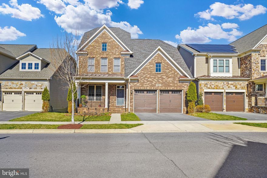 Step into luxury with this breathtaking 4-bedroom, 4.5-bath Fuller model home, perfectly situated in the prestigious Cabin Branch community. Designed for both elegance and comfort, this spacious home features soaring 11-foot ceilings, rich hardwood floors, and a cozy gas fireplace, creating an inviting atmosphere. The gourmet kitchen is a chef’s dream, showcasing sleek quartz countertops, a large center island, dual wall ovens, and a walk-in pantry. Retreat to the private primary suite, complete with a serene sitting area, a generous walk-in closet, and a spa-inspired bath featuring a soaking tub and a separate shower. 
The finished walkout basement offers endless possibilities, including a full bath, a spacious recreation room, and a rough-in for a future wet bar. Step outside to unwind on the expansive deck with stairs leading down to a charming sit-out patio, all while enjoying tranquil wooded views. 
Conveniently located near Cabin Branch Elementary, Black Hill Regional Park, Clarksburg Premium Outlets, and I-270, this home seamlessly blends luxury and convenience for the perfect living experience.