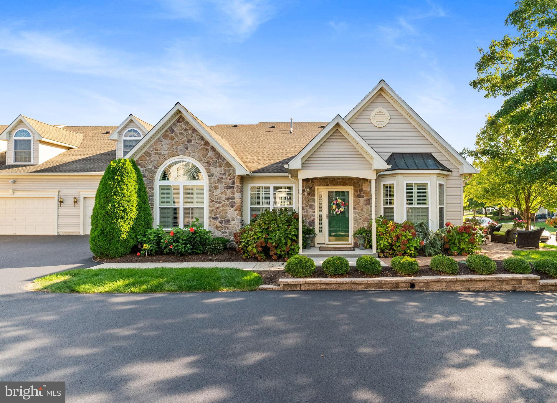 Discover the perfect active lifestyle within a highly sought-after 55+ community. This move-in ready, 3-bed plus Sunroom, 3-bath carriage home nestled in The Villas at Shady Brook offers incredible value! Follow the pristine hardwood floors that span the majority of the first floor of this desirable Thornhill model and enjoy an open floor plan from the entry leading to the living/dining room combo and family room open to the eat-in, Gourmet kitchen. Designer owned and inspired features include plantation shutters, updated carpet, lovely palette and elegantly updated primary bath. Other notable features include Palladium windows, cathedral ceilings, decorative moldings and gas fireplace with stone surround. The impressive kitchen with its stylish breakfast bar offering additional seating boasts both functionality and beauty with an abundance of upgraded neutral cabinetry highlighted by unique tile backsplash, under cabinet lighting and stainless-steel appliances. Anchoring the kitchen is a convenient mud/laundry room decorated with storage cabinets and access to the 2-car garage enhanced with a bonus, large storage closet. A desirable Sunroom drenched with natural light features a door leading to an extended paver patio with retractable awning making it a soothing retreat. You will discover that this home boasts a convenient main level, spacious primary suite that effortlessly blends comfort and elegance with its tray ceiling, walk-in closet and updated bath with double comfort-height vanities, walk-in shower and linen closet. Completing this level is a second bedroom, currently used as an office, a full hall bath, linen and coat closets. A rear staircase leads up to a 2nd floor loft showcasing a third bedroom with sunny dormer window, generous walk-in closet, full bath and finished utility closet for bonus storage. The amenity-rich community includes a grand clubhouse with fitness center, sports bar, billiard, library, indoor & outdoor pool, tennis courts, game room, as well as scenic ponds, walking trails, and a multitude of activities. Located a few minutes to the new Wegmans, Shady Brook Farm and the I-295 corridor so travel is a breeze. The Villas at Shady Brook offer a rural community feeling with easy access to everything and low maintenance living. Enjoy the lifestyle you have been waiting for in your next chapter – you will simply love it!