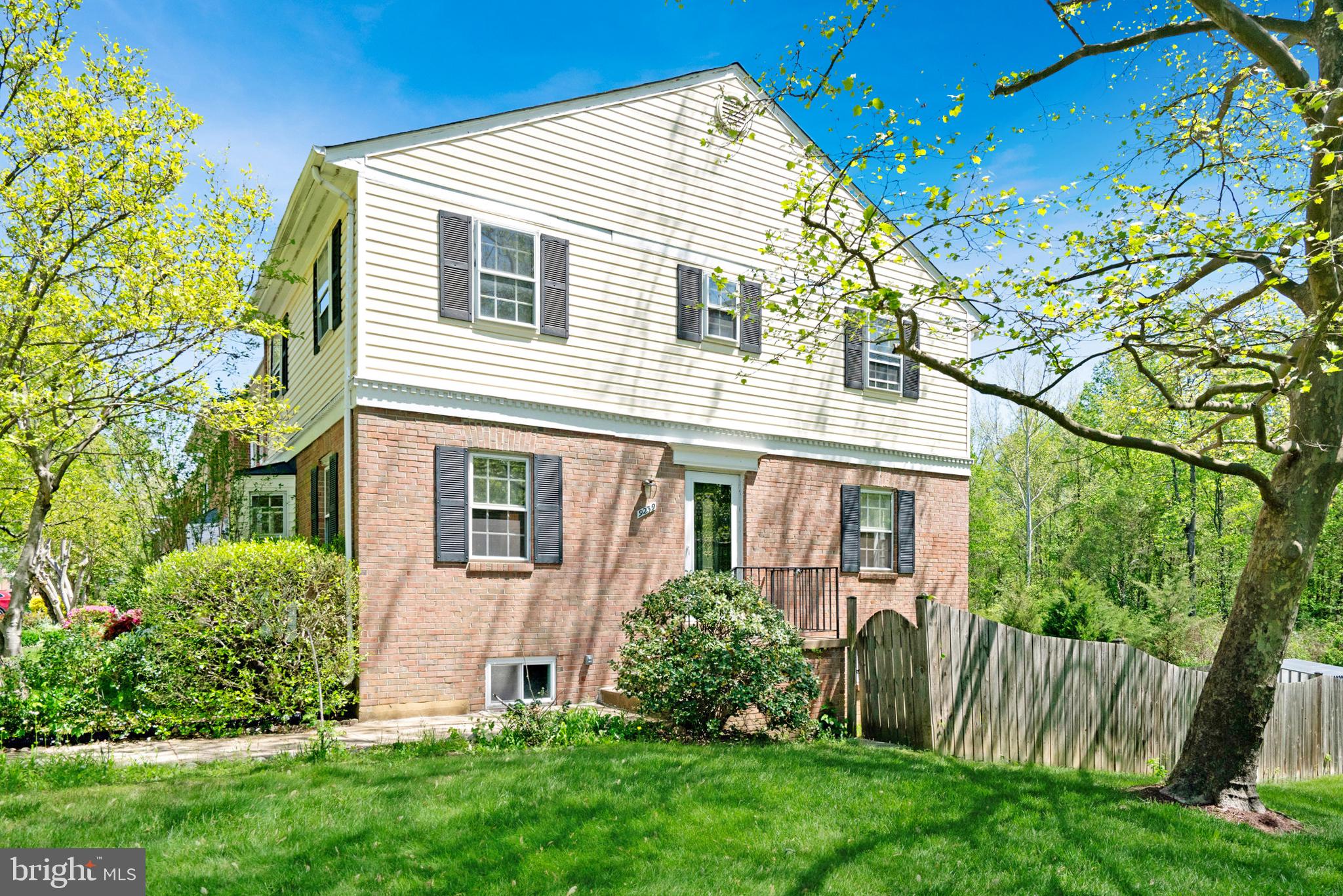 Motivated seller, bring us an offer! Welcome to 9239 Sand Creek Court — a beautifully updated end-unit townhome featuring 4 bedrooms, 3 full bathrooms, and a half bath. This light-filled home offers a spacious open floor plan with fresh paint throughout, gleaming hardwood floors on the main and upper levels, and a fully finished lower level. The expansive family room with a cozy fireplace flows effortlessly into the large eat-in kitchen, making it ideal for everyday living and entertaining. Step outside to a fully fenced backyard backing to a vast open area of common space — perfect for relaxing, barbecuing, or hosting gatherings. The walkout lower level includes a den and full bathroom making it ideal for longer-term guests. The home also includes two reserved parking spaces and plenty of guest parking. A perfect combination of comfort, style, and convenience - only minutes from the Burke VRE station for easy commuting. Schedule your showing today!