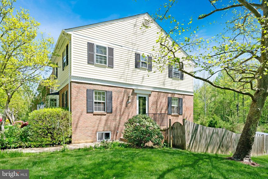 Motivated seller, bring us an offer! Welcome to 9239 Sand Creek Court — a beautifully updated end-unit townhome featuring 4 bedrooms, 3 full bathrooms, and a half bath. This light-filled home offers a spacious open floor plan with fresh paint throughout, gleaming hardwood floors on the main and upper levels, and a fully finished lower level. The expansive family room with a cozy fireplace flows effortlessly into the large eat-in kitchen, making it ideal for everyday living and entertaining. Step outside to a fully fenced backyard backing to a vast open area of common space — perfect for relaxing, barbecuing, or hosting gatherings. The walkout lower level includes a den and full bathroom making it ideal for longer-term guests. The home also includes two reserved parking spaces and plenty of guest parking. A perfect combination of comfort, style, and convenience - only minutes from the Burke VRE station for easy commuting. Schedule your showing today!