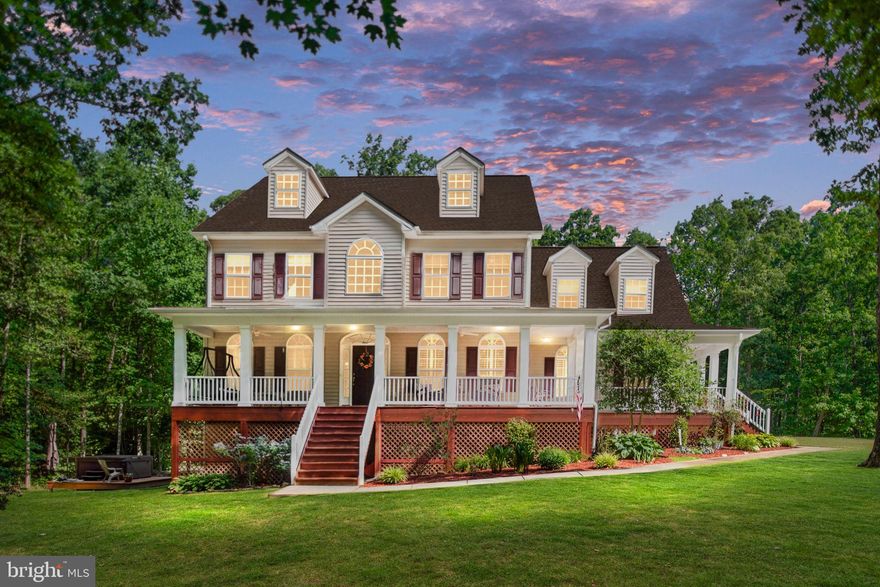 Nestled in the heart of Prince William County, 14439 Aden Road offers a captivating blend of rural charm and modern comfort. This picturesque six-bedroom, 5.5-bath residence sits gracefully on 10 acres of scenic countryside.

Upon arrival, you are welcomed by a serene ambiance and lush landscaping, setting the stage for a peaceful retreat. Step inside to discover a meticulously maintained interior featuring red oak hardwood floors, detailed millwork, and tons of natural light. 

The kitchen, the heart of this home, is a chef's dream featuring granite countertops, brand-new stainless steel appliances, and custom hardwood cabinetry. The spacious floor plan offers both a formal dining room and a generous breakfast nook, ideal for entertaining and daily living. Additionally, there is a generous-sized in-law suite.

Upstairs, the expansive primary suite awaits, offering a peaceful retreat with its own ensuite bathroom, his and her's walk-in closets, and private screened porch. Two of the three additional generously sized bedrooms have ensuite bathrooms and provide plenty of space and comfort for a growing family or guests.

The impeccably finished walk-out basement provides the ultimate in-home comfort and entertainment space. The spacious rec room ( currently used as an at-home gym) is ideal for relaxation and hosting. Adjacent, a media room awaits with a cedar-lined wine collar. To finish off the lower living level, you will find the sixth bedroom and fifth full bathroom.

The expansive yard offers vast space for outdoor activities, gardening, or simply enjoying the natural surroundings on the extra-wide wraparound porch. A detached deck and hot tub complete the outdoor oasis.

Whether you're seeking a weekend retreat or a permanent residence, 14439 Aden Road presents a rare opportunity to embrace countryside living without sacrificing convenience.