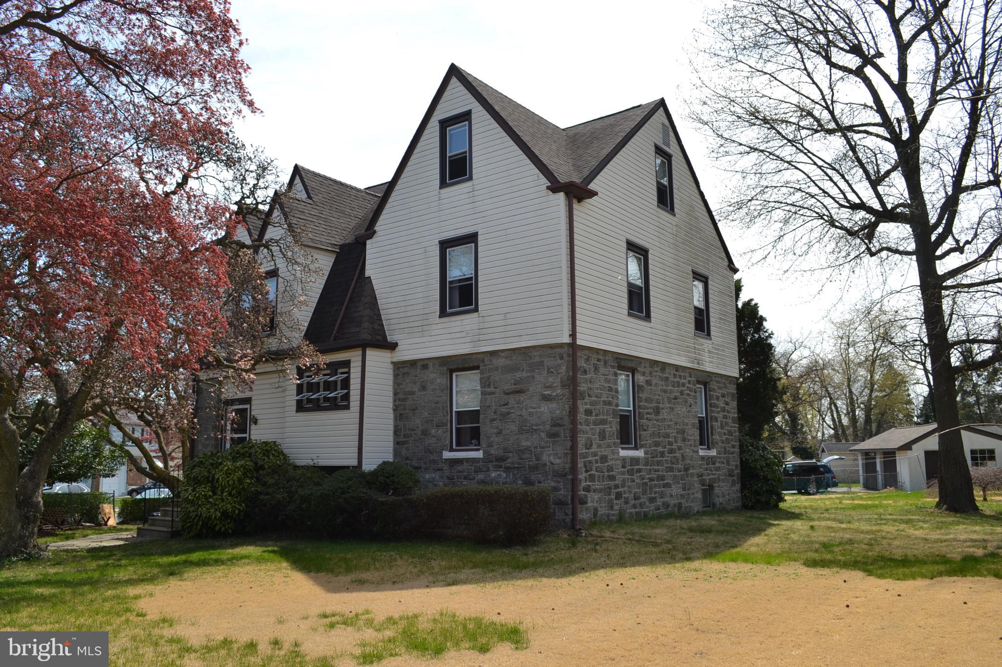 This super spacious single home features Old World Charm throughout! It has beatiful oak baseboards, door and window frames, grand staircase and elegant pocket doors.  Every room is oversized and awash with daylight. There are 3 floors with 6 incredible bedrooms, 1 full bath, utility room and a back staricaee that has been decommissioned but easliy opened back up when the kitchen is remodeled.  The original front porch has been enclosed and used as a bonus room.  There is an unfinished basement with laundry area and outside exit.  The kitchen is eat in with a mud room and additional full bath in it.  Just when you thought it couldn't get any better there is a fantastic sun room overlooking the fenced yard complete with an oversized detached garage.  The house is being sold in  "as is" condition and in need of updating but has tremedous potential.