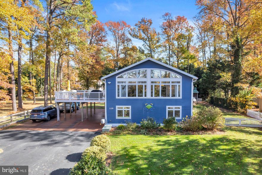 Welcome to this beautiful Kent Island home with views of the Chesapeake Bay offering two full living spaces & entertaining — a spacious main level and a private in-law suite — perfect for multigenerational living, media room or guest accommodations.

The main living area, located on the second floor, features vaulted ceilings with exposed cross-beams, creating an open and airy feel. The living room showcases a wall of windows that fill the space with natural light and offer views of the Chesapeake Bay. A propane stove adds warmth and charm. The kitchen is a chef’s delight with stainless steel appliances, a center island with counter seating, pendant lighting, a gas range, and a convenient side bar with desk area and ample cabinetry for storage. The dining area features a stylish light fixture, perfect for entertaining. The primary bedroom includes full-size and clerestory windows and a private ensuite bath with a step-in shower. There are two additional guest bedrooms one with a laundry area inside a closet as well as a large full bath with jetted tub, double sinks. The lower level functions as a complete in-law suite with its own full kitchen, living room, and dining area, a sun room, and an additional family room along with three bedrooms and two full baths, each with step-in showers. There is a second laundry room on the lower level for added convenience. This level opens directly to the fenced yard, which includes a gardening shed and plenty of space for outdoor living. Additional highlights include parking for up to 9 cars with a driveway and carport.

This home is equipped with an energy-efficient geothermal heating and cooling system, ensuring year-round comfort. The landscaped yard is framed by mature trees, providing shade and serenity. 

Enjoy the best of Kent Island living—coastal charm, beautiful Chesapeake Bay views, and modern efficiency—all in a peaceful setting close to marinas, nature trails, and local amenities.