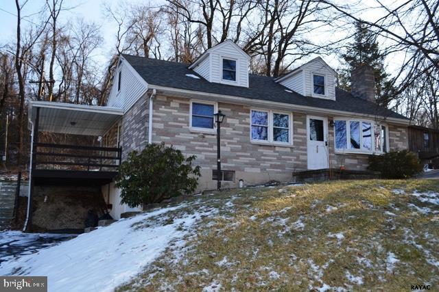 Gorgeous Inside! Newly Remodeled 3-4BR Cape Cod in Saginaw area. Hwd Flrs throughout 1st flr, living room has bay window w/ a fantastic view & wood fireplace, covered porch, tandem 2 car garage, Basement could easily be finished for added living space, 2nd Flr could be converted to master suite w/ large walk-in closet & half bath. Koi pond, yard backs to woods.