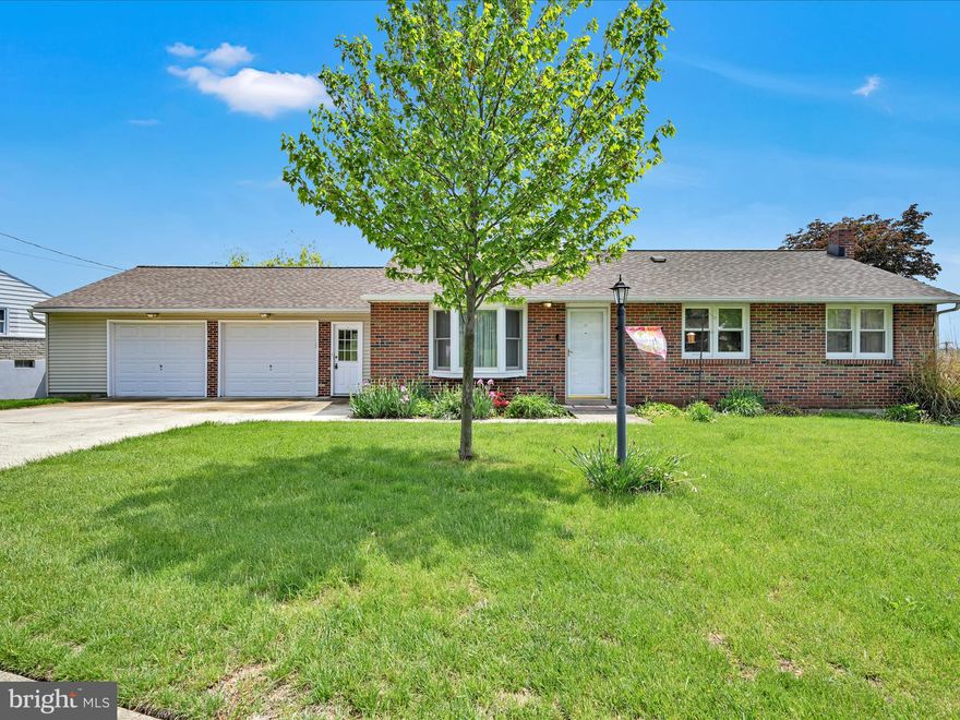 Where Comfort Meets Character: A Rare Ranch Retreat

Nestled on a peaceful corner lot in a warm, welcoming neighborhood where laughter echoes from porches and bike wheels hum down tree-lined streets, this move-in ready ranch is more than just a home—it’s a sanctuary of charm, space, and story.

Step inside to a main level where life unfolds with ease and grace. Soft carpet and rich laminate dance beneath your feet, leading you through an open-concept living and kitchen area where sunlight pours through updated windows, illuminating a space designed for everyday living and effortless gatherings. The heart of the home—an open kitchen—blends form and function with sleek granite counters, a stylish tiled backsplash, a generous pantry, and all appliances thoughtfully included.

Three serene bedrooms and a full bath complete the upper level, including a peaceful master retreat with plush carpeting and classic finishes. But the story doesn’t end there.

Descend to a beautifully finished walkout lower level that expands your living possibilities: an additional bedroom and full bath, a personal workout zone, ample storage, and a bright laundry area ready for your routines.

Step outside, and the real magic begins. From the expansive 20x14 composite deck, watch the seasons change over a lush yard. Tend to your garden, sip your morning coffee on the covered porch, or host unforgettable gatherings on the spacious patio—all framed by panoramic views and skies that stretch for miles.

And the extras? They're what make this house a rare gem. A newer oversized double garage—complete with its own basement and an oil change pit—stands ready for hobbies and handiwork. Gutter guards, replaced windows, 200-amp service, and hidden hardwood floors beneath the carpet ensure both beauty and peace of mind.

This is not just a house. It’s a chapter waiting to be written. Welcome home.