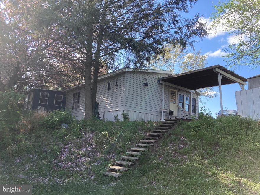 Million-dollar view for $64,900! This gorgeous home features new carpet, trendy shiplap, stunning skylights, and a million-dollar view. Yes, you read that right. The view from the backyard is priceless. With summer coming, enjoy nights in the backyard around the firepit with a killer view. This won’t be on the market long!