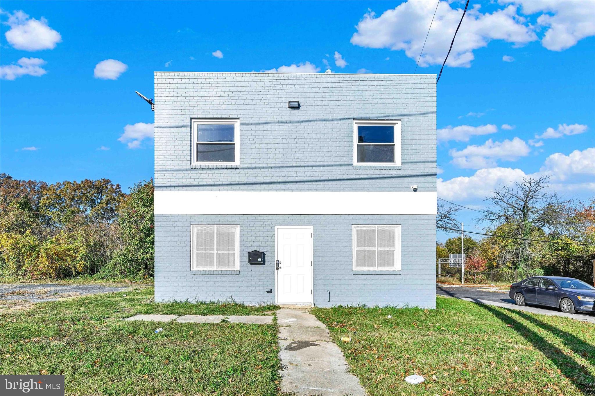 Explore the endless possibilities of 2400 Annapolis Rd—a versatile property ready to be transformed into your ideal home or a dynamic live-work space. Currently configured as an office, this two-story building offers the potential for a 2-bedroom residence in a highly sought-after location with abundant parking. The main floor boasts generous, flexible spaces with built-in features, perfect for creating a cozy living area or home office, along with a convenient bathroom. Upstairs, a newly renovated kitchen with shaker cabinets and a cooktop, plus a full bathroom with a shower, provides all the essentials for comfortable living. With residential and mixed-use zoning, this property offers a range of opportunities, including the potential for rental income. Discover the lifestyle you could build here—schedule a tour today and envision the possibilities!