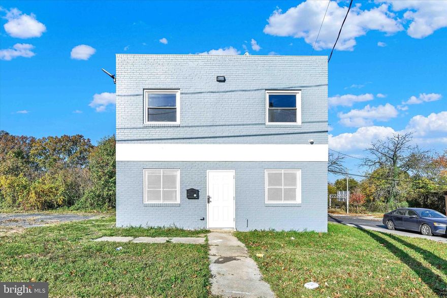 Explore the endless possibilities of 2400 Annapolis Rd—a versatile property ready to be transformed into your ideal home or a dynamic live-work space. Currently configured as an office, this two-story building offers the potential for a 2-bedroom residence in a highly sought-after location with abundant parking. The main floor boasts generous, flexible spaces with built-in features, perfect for creating a cozy living area or home office, along with a convenient bathroom. Upstairs, a newly renovated kitchen with shaker cabinets and a cooktop, plus a full bathroom with a shower, provides all the essentials for comfortable living. With residential and mixed-use zoning, this property offers a range of opportunities, including the potential for rental income. Discover the lifestyle you could build here—schedule a tour today and envision the possibilities!