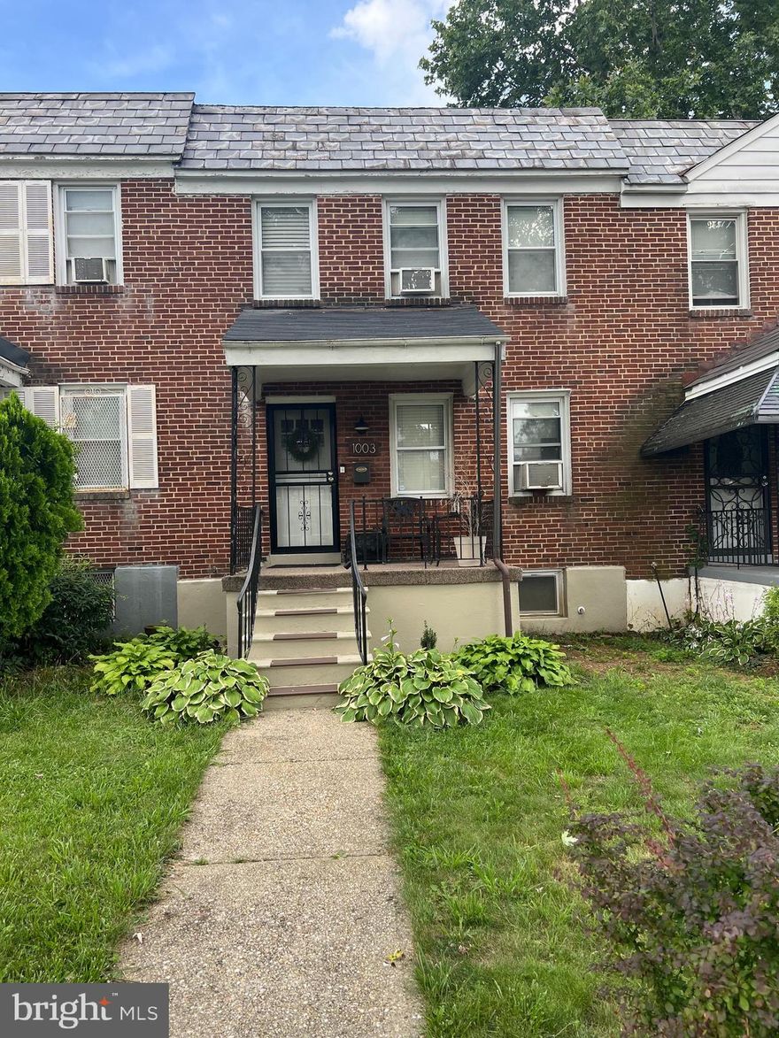 Back On The Market...Buyer's financing fell through. Cute and quaint with curb appeal!!  Charming 3 bedroom, 1.5 bathroom townhome in the heart of Baltimore is absolutely delightful. This updated spacious rowhome is a must-see!  It has all the special bells and whistles that make this house feel like "a home". Enjoy the warm, inviting barnyard doors, classic wood floors, recess lighting, adorable kitchen peninsula, large separate dining room and traditional floorplan on the main level.  The roomy bedrooms on the upper-level offer plenty of bedroom space and the full bath is full of character and cuteness. You'll love the comfy, relaxing family room on the lower level with separate elaborate laundry room, new flooring, shelving and ample storage in the finished basement. Add to that, the 2-car parking pad in the rear with additional space to entertain in the sizeable backyard and it's easy to see that this one won't last long. Schedule your showing today!!