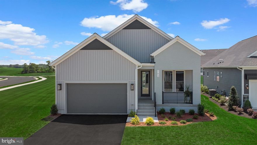 Step into the Sierra 39-F2 – Homesite 1025 at Hiatt Pointe (55+)—a two-car, front-load garage SINGLE FAMILY home with four bedrooms and three full bathrooms will be ready IMMEDIATELY.. Designed for ease and everyday function, this factory-framed floorplan is as innovative as it stylish! Enter through the inviting front porch and be immediately welcomed by 9’ ceilings on both levels, oak main stairs, and expertly selected finishes that make this home truly one of a kind. The heart-of-the-home kitchen is complete with white soft-close cabinetry, black quartz countertops with a concrete finish, an oversized island with a built-in trash can, and a walk-in pantry with solid-shelving. Whether you're preparing a quick meal or hosting, the Samsung® stainless steel appliances—including a five-burner cooktop with chimney hood, single wall oven, refrigerator, microwave, and dishwasher—make every moment in the kitchen feel seamless and enjoyable. As you make your way through the home, the open-concept floorplan invites you to unwind in the great room, where a cozy electric fireplace sets the mood for relaxing moments. Outdoor living extends your space even further with a 20’ x 12’ walkout deck and covered porch off the great room—perfect for quiet morning coffee, casual meals, or scenic backdrop. Throughout the home, enjoy luxury vinyl plank (LVP) flooring throughout the entire home, while the bathrooms offer ceramic tile flooring for timeless style and practical comfort. The main level primary suite includes a spa-inspired bathroom with dual vanities, white soft-close cabinets, textured quartz countertops, a roll-in frameless shower with neutral floor-to-ceiling tile, and elongated comfort-height toilets—creating a luxurious retreat that balances accessibility and elegance. For extra entertainment or hosting guests, the walkout finished basement offers a spacious rec area, an additional full bathroom, and two bedrooms. The two-car finished garage with electric opener and exterior keypad adds daily convenience and extra storage. Built for comfort and sustainability, this home features smart home technology and energy-saving innovations, including a Home Automation Package with IQ Panel 4, Ecobee® smart programmable thermostat, tankless gas water heater, energy-efficient insulation techniques, and more. Plus, it’s solar panel ready—offering a seamless path to energy independence whenever you choose to take the next step.----- Discover Hiatt Pointe at Snowden Bridge, a gated active adult community designed for 55+ living, where every day brings new opportunities to connect, unwind, and thrive. Start your morning with a yoga session or workout in the fitness center before joining friends for a game of pickleball or billiards. In the afternoon, lounge by the outdoor pool and hot tub, then gather around the gas fire table as the sun sets. The clubhouse serves as the heart of the community, offering inviting spaces for social events, group activities, and quiet relaxation. Outdoor kitchens and scenic patio areas set the stage for effortless entertaining, while a low-maintenance lifestyle ensures more time for what matters most. With easy access to Route 7, I-81, and I-66, Hiatt Pointe offers the perfect blend of resort-style amenities and a welcoming, connected community.----- Take advantage of closing cost assistance by choosing Intercoastal Mortgage and Walker Title. ----- Other homes sites and delivery dates may be available. -----Pricing, incentives, and homesite availability are subject to change. Photos are used for illustrative purposes only. For details, please consult the Sales Team.