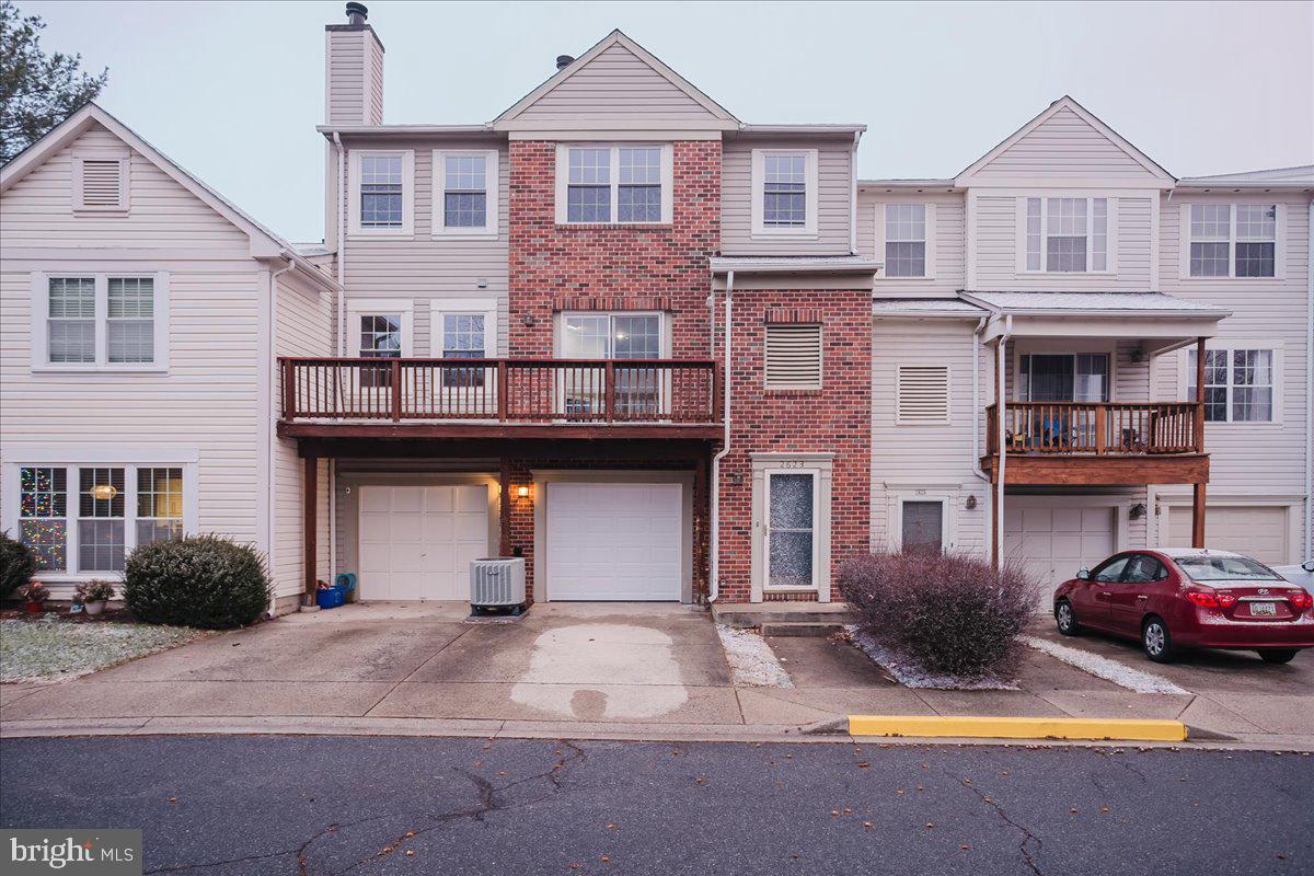 Priced To Sell Fast! Hot Brick Front 3 Level Condo with 1 Car Garage, Spacious Kitchen with Stainless Steel Appliances, Spacious Bedrooms, New Custom Paint, Hardwood Floors, Walk in Closet, New Lighting, Fireplace, Balcony, Much More!! Close to Schools, Shopping, and Commuter Routes. This Will Not Last!