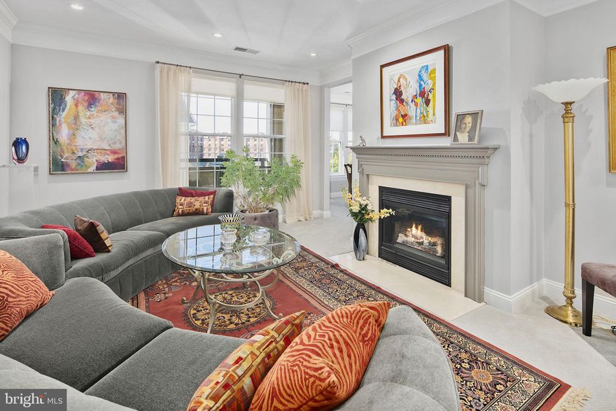 Welcome to Fallsgrove! Rare and beautiful 3BR plus den, top floor corner unit with more space than many townhomes on a single convenient level. Tons of great features throughout, including high ceilings, private garage parking, flowing floorplan, and a plethora of natural light through lots of large windows and two exposures. Formal living room with gas fireplace, formal dining room leads to private balcony. Gourmet eat-in kitchen with stainless steel appliances, plenty of cabinet space, kitchen island with gas range. Spacious master suite with 2 walk-in closets, ensuite bath with glass-enclosed shower and soaking tub. Two additional large bedrooms, beautifully updated full bath, plus study/den with lots of built-in shelving. Convenient in-unit laundry, and fantastic private garage with space for parking and storage, plus additional carport. Located in a quiet residential community, but super close to plenty of retail, dining and entertainment, as well as easy commuting via 270 and the 495 Beltway. Nearby schools include Lakewood Elementary School, Thomas S. Wootton High School and Fallsmead Elementary School. Convenient to Safeway and Giant Food, nearby coffee shops like Mediterranean Cafe, Starbucks and Black Lion Cafe, and restaurants like Sunny's Grill and Melt Cafe and Gelato Bar. Close to Monument Park, Falls Road Park and Mattie JT Stepanick Park. So much to love!