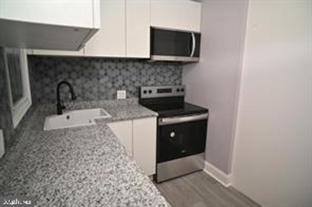 Photo of 2544 Druid Hill Avenue, BALTIMORE, MD 21217 (MLS # MDBA2192108)