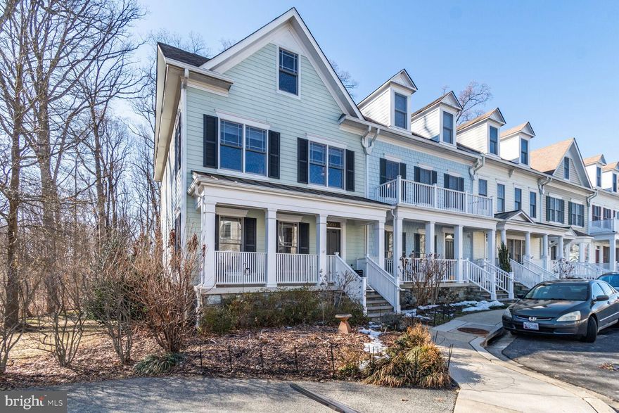 Exquisite  4-level, 4 bedroom/3.5 bath end unit EYA Townhouse backs to Rock Creek Park.  This is the best location in the community! Beautiful finishes throughout, all modern amenities and fixtures, flexible floor plan with space for all of your needs, all lovingly maintained by owners.  Enter from the sweet front porch into the open living room/ dining area, then  back to the large kitchen /family room with fireplace with deck that overlooks the park.  The kitchen features granite counters, recent stainless appliances, a large breakfast bar and table space. There is a  main floor powder room for your convenience. The second  level features 3 bedrooms and 2 baths: the owner's suite has a luxurious bathroom and walk in closet.   The loft level features a large open flex room with vaulted ceilings and full bath: could be owner's suite #2, offices, guest room, playroom, etc.   There is a second deck off this level: enjoy the views to Rock Creek Park. The lower level is another flex space: family room or office, with huge storage closet and entry from 2-car garage on this level.  Hardwood floors throughout for a superb finished feel. Nature lovers will appreciate not only the easy access to park trails but also the seller's gorgeous perennial garden out front.  You will have beautiful blooms all through the spring,summer,and fall seasons. Low monthly HOA fee includes Fitness Center membership.  About 1 mile to METRO, convenient to I-495 and all commuter routes, shopping and restaurants galore nearby.