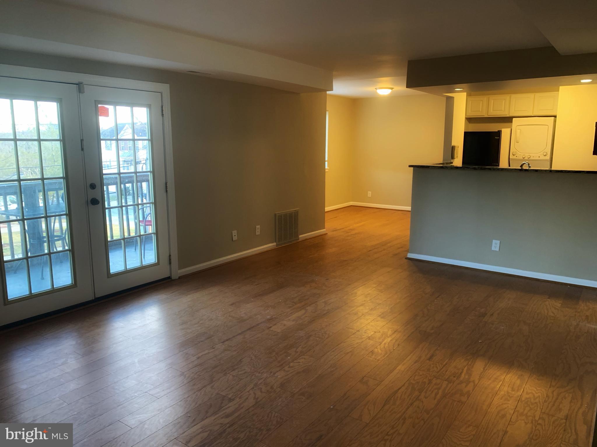 This spacious 2-bedroom, 2-bathroom condo in a charming garden-style building offers over 1,000 sq. ft. of comfortable living space. The home features hardwood flooring throughout the main living areas, with cozy carpeted bedrooms for added comfort. Enjoy the convenience of central air conditioning and heating, an in-unit washer/dryer, and modern gas appliances. The primary bedroom includes an in-suite bathroom with a walk-in shower, and the kitchen is fully equipped with a dishwasher, garbage disposal, and ample cabinet space. Step through elegant French doors onto your private balcony, perfect for unwinding after a long day.
Nestled in a quiet section of a bustling city, this condo offers easy access to shopping, entertainment, public transportation, and major highways, including I-495 and Route 50.
Offers will only be considered by prospective buyers who intend to live in the unit as an owner-occupant.