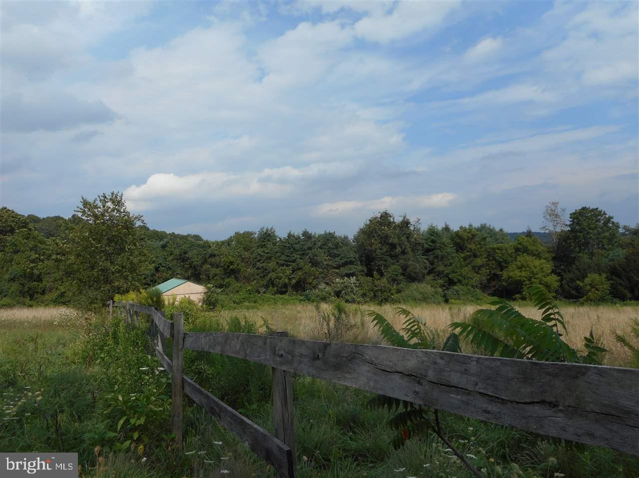 Build your dream home on this little piece of paradise located just over the MD/PA line. Beautiful level 2.89 acre lot with incredible views. Country living at its' finest.