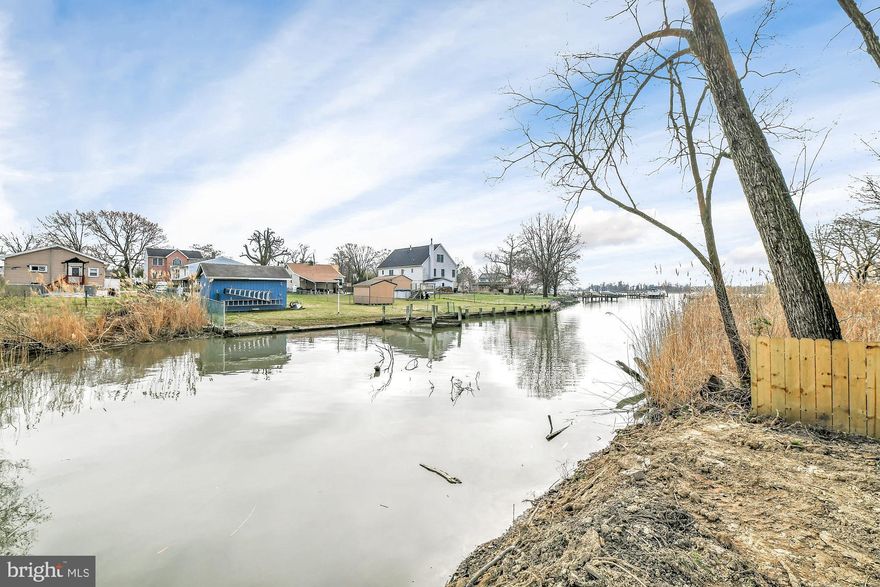 Better then new!! This newly rehabbed Rancher backs to Jones Creek and features a boat ramp so you may launch a flat bottom boat, jet ski, kayak or canoe. As you approach the property you will see a detached 2 car garage and driveway long enough for 8 cars. The property is large at almost half an acre. Inside you have a large living room with wood laminate floors and large open kitchen & new designer white cabinets, new butcher block countertop and new stainless steel appliances.  The floorplan is open and lives the way todays families desire. The hallway leads to a Masterbedroom with Masterbath and sliding glass door from the masterbedroom to a deck facing the water. There are 2 other bedrooms as well and a newly designed hall bath. The 4th bedroom / family room also has a sliding glass door leading to a deck facing the water.  The large yard is flat and perfect for entertaining. Picture cookouts and firepits near the water.  Everything in this home is new: new roof, new siding, new windows, new electric, new light fixtures, new ceiling fans, new flooring, new cabinets, new hvac, new water heater, new vanities and 2 new bathrooms. Hurry this home will not last long! Schedule your showing today!