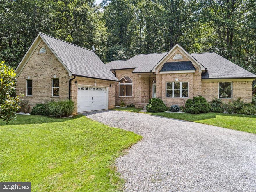 Privacy Meets Convenience on This Custom-Built 3-Acre Retreat – No HOA!

Nestled on a serene and secluded 3-acre lot, this one-of-a-kind all-brick rambler masterfully blends timeless elegance with nature’s tranquility—offering the perfect balance of peaceful seclusion and community connection. A rare find in today’s market, this home is a haven for those seeking both escape and engagement—all without the restrictions of an HOA.

From the moment you arrive, you’ll notice the custom architectural brick detailing and low-maintenance exterior that set the tone for the thoughtful design found throughout. Inside, soaring ceilings—ranging from 10 to 14 feet—flood the home with natural light, creating an airy, expansive atmosphere.

Highlights include:

• A stunning living room with cathedral ceiling

• Tray ceiling in the luxurious owner’s suite

• Vaulted hexagon ceiling in the sunlit breakfast area

• Raised ceilings in common areas and 9-ft ceilings in secondary bedrooms and bath

The heart of the home boasts a bright, open-concept kitchen complete with new stainless-steel appliances, abundant cabinetry, walk-in pantry, and a spacious eat-in breakfast area—perfect for everyday living or entertaining. Adjoining this space is a warm and welcoming family room that invites relaxation and connection.

Retreat to the owner’s suite, a private oasis featuring a spa-inspired bathroom with cathedral ceiling, separate walk-in shower, dual vanities, large walk-in closet, and private water closet. Additional bedrooms offer generous space, natural light, and distinctive architectural touches like a 3-row window bump-out with marble shelf.

Working from home? A spacious office with glass French doors provides both functionality and privacy.

Step outside to your personal backyard retreat, framed by mature landscaping, including a Magnolia tree, crepe myrtles, decorative marble-chip flower beds, and a lush Zoysia lawn. A vinyl privacy fence on the sides and chain-link at the back ensures both security and scenic views—plus, a small stream runs along the north side of the property for a natural touch of serenity.

Additional Features Include:

• No HOA

• New roof with transferable warranty (2023)

• Refinished hardwood floors, new carpeting throughout, and luxury vinyl tile in kitchen (2025)

• Fresh paint throughout (2025)

• Three storage sheds + 20-ft steel storage container

• Extensive LED lighting with dimmers throughout

• Lighting in all closets, kitchen counters, and showers

• Eight ceiling fans, including a remote-controlled fan in the living room

• Low-E/Argon gas-filled windows

• Multi-stage heat pump with heater package, UV germicidal light, and humidity control

• Wi-Fi thermostat with full reporting

• Pellet stove for added warmth

• 400-amp electrical service

• Verizon 5G UW high-speed internet

With its thoughtful design, modern updates, and unmatched setting, this home is a true sanctuary. Don’t miss your chance to experience a serene lifestyle in this unique and exceptional property—with no HOA to limit your freedom!

Be sure to check out the video walk through link for a better look!