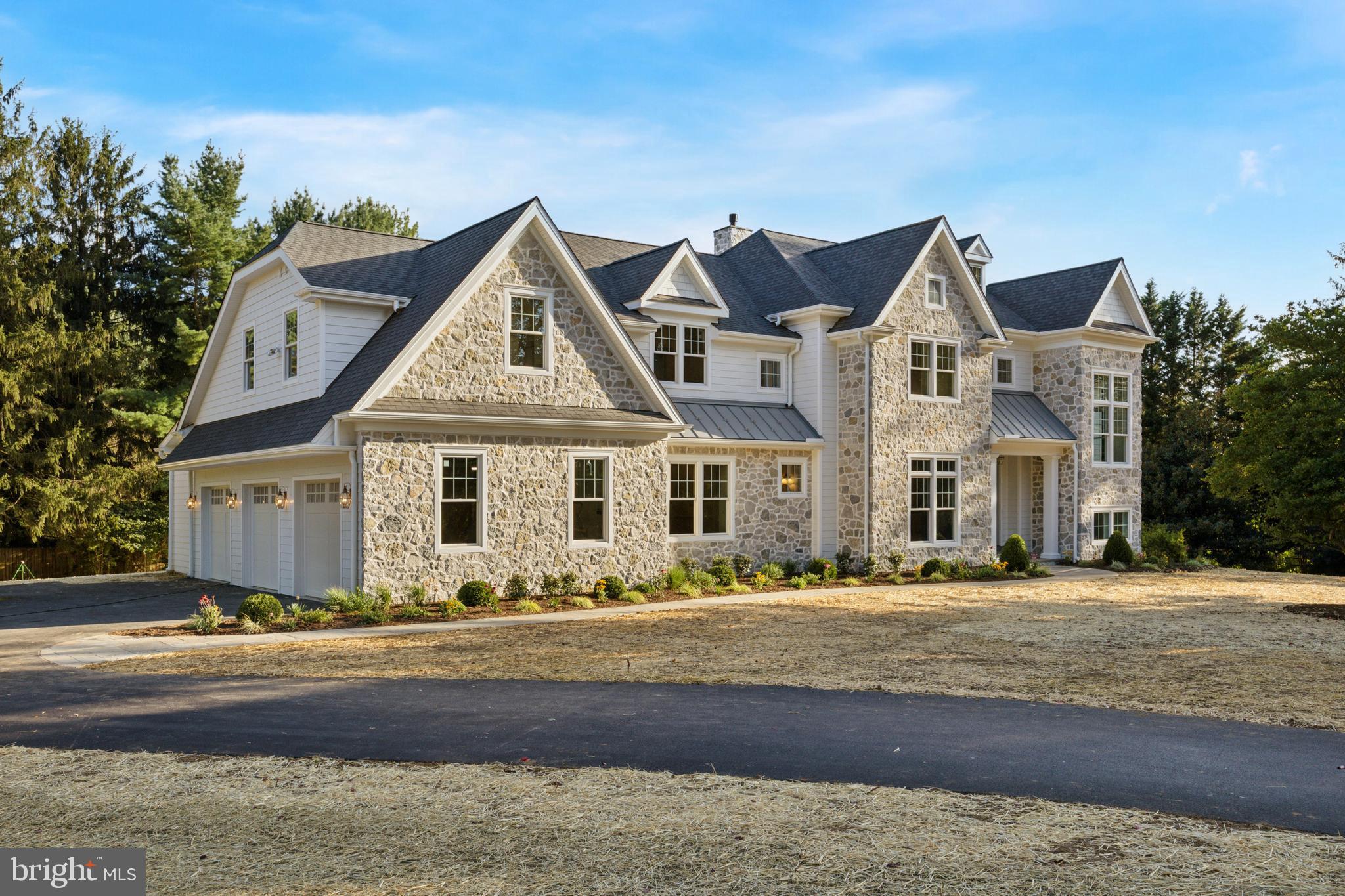 Welcome to 2205 Buttonwood Road! Located in the heart of Easttown Township, this exquisite new home offers unparalleled luxury and modern living. Set on a picturesque 1.6-acre lot surrounded with mature plantings, the property provides serene pastoral views along the esteemed Buttonwood Road. Upon entry, be greeted by a spacious foyer that seamlessly flows into the home's main living areas. Designed for both comfort and elegance, the living room and great room share a sophisticated double-sided fireplace, perfect for intimate gatherings or grand entertaining. At the heart of the home lies an open-concept gourmet kitchen equipped with top-of-the-line appliances, a generous breakfast room, and a sought-after scullery, catering to culinary enthusiasts and entertainers alike. The first-floor study, complete with a full bath, offers flexibility as a potential sixth bedroom, guest suite, or private home office. On the residence level, the expansive primary bedroom serves as a private retreat, featuring a spa-like ensuite bath designed for ultimate relaxation. Four additional generously sized bedrooms accompany the primary suite, with two boasting ensuite baths and the remaining two sharing a well-appointed Jack and Jill bathroom. A dedicated retreat area provides additional living space, while a conveniently located laundry room enhances functionality. Partially finished basement has many options to make it your own. All of this and situated within the award-winning Tredyffrin/Easttown School District. This is a rare opportunity to own a bespoke residence in one of Chester County’s most coveted locations.
Construction Update: The home is being framed. Final specifications are in. With construction underway, there remains time to personalize finishes and features to make this home uniquely yours. Note: Listing photos are from the same home plan constructed in '24. Photos may contain upgrades. For more details, please reach out to Paul Czubryt.