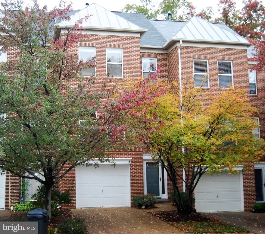 FABULOUS CONTEMPORARY 3 BEDROOM 3.5 BATH PLUS POSSIBLE 4TH BEDROOM (LOWER LEVEL)! GOURMET WHITE KITCHEN BLACK GRANITE, STAINLESS STEEL APPLS & GAS COOKING. BREAKFAST BAR & BREAKFAST ROOM W/ GAS FIREPLACE LEADING TO REAR DECK OVERLOOKING MATURE TREES. SPACIOUS FORMAL DINING ROOM & INVITING LIVING ROOM. GLEAMING HARDWOOD FLOORS THRU OUT. PRIMARY BEDROOM W/ PRIVATE MASTER BATH, SOAKING TUB & SEPARATE SHOWER. LOWER LEVEL (POSSIBLE BEDROOM #4) LEADS TO REAR PRIVATE FENCED GARDEN PATIO.  INCLUDES COMMUNITY POOL & FITNESS ROOM. ONLY A FEW BLOCKS TO RESTON TOWN CENTER. LESS THAN 3 MILES TO RESTON STATION METRO! MINUTES TO EVERYTHING!  RESTON LIVING AT IT'S BEST!