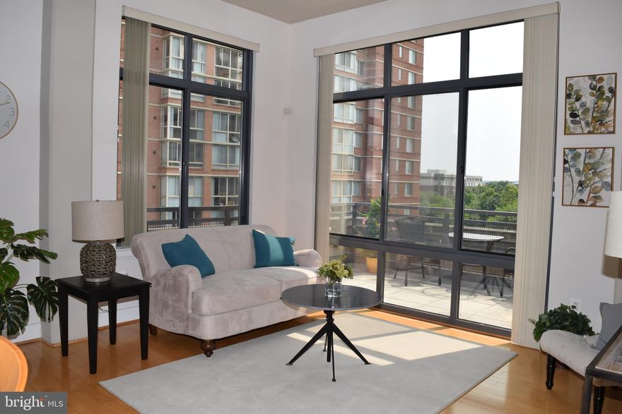 ABSOLUTELY Immaculate condo with fabulous views of Olde Towne Alexandria.  Unfurnished for $2,650 per month.  Furnished $2900 per month- Hardwood floors throughout.  Perfect size gourmet kitchen with stainless steel appliances, granite counters and island breakfast bar.  Large Master Bath with walk in closet and Full Bath.  Darling balcony overlooking the town!  1 parking space - G1 #52 and extra storage - unit A5.  Stack-able washer and dryer in unit.