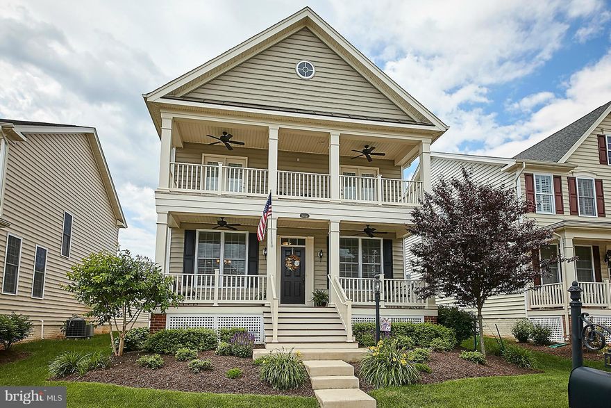 Southern Charm of Elevation includes Upper Level Veranda w/Views of Bull Run Mt & Large Front Porch-both w/Ceiling Fans*Hardwood Flooring on Main Level*Designer Paint*Gourmet Kitchen inc Granite Counters*Island*Stainless Steel App*Master Suite w/Tray Ceiling*Upgraded Bath w/Shower & Tub*Huge Walk in Closet*Three Additional Bedrooms & Bath*Finished Lower Level*Full Bath*Rec Room*Rear 2 Car Garage