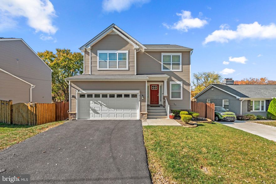 So many beautiful updates just for you! Hardwood floors on main level and upper level! Oak tread staircases. Stunning kitchen features Calcutta Quartz Countertops with backsplash, Stainless Steel Appliances, Island and Craftsman Cabinetry. Step outside and enjoy dining alfresco on the spacious deck overlooking the mature trees! Welcoming family room boasts inviting fireplace with wall trim package. Sophisticated dining room perfect for entertaining during the holidays.  Lower level showcases a media room , bedroom, office, storage and is enhanced with luxury vinyl floors and TV wall mount .  A sliding glass door leads to an incredible fenced-in backyard featuring a newer paver patio with a firepit to cozy up too! 
Retreat upstairs to the bedroom level featuring  handsome hardwoods in very spacious bedrooms. Owner's bedroom showcases a fandelier, a large walk-in closet with built-in drawers and storage, Indulge in owner's bath equipped with large soaking tub, separate shower and double bowl vanity. Laundry room location is on main level and includes the washer and dryer.