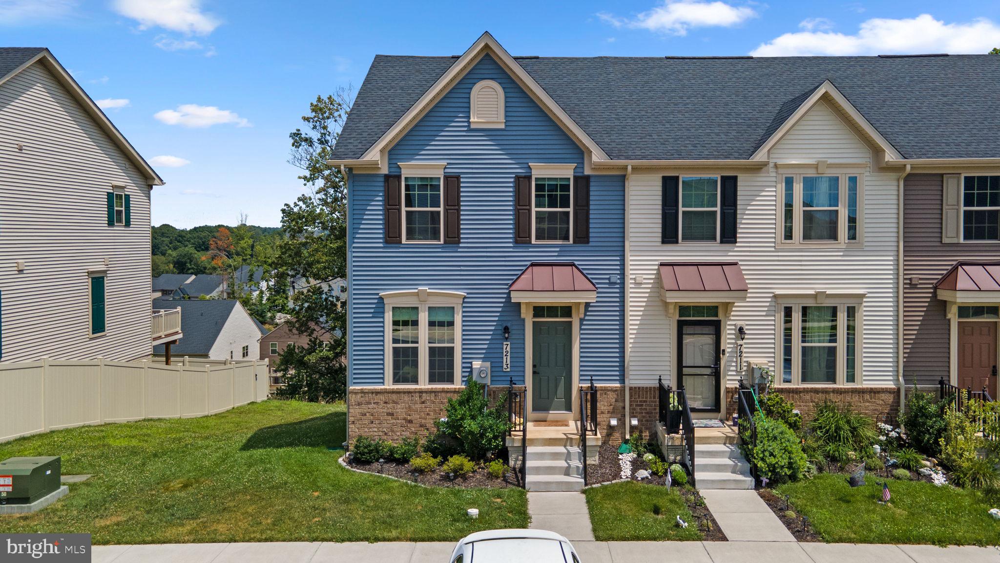 Live Where You Play – Lake-Style Living at Its Finest!
Welcome to this stunning end-unit townhome, built in 2022, and nestled in the heart of the highly sought-after Hamptons East Village within the Lake Linganore community. With over 2,000 finished square feet, this meticulously maintained 3-bedroom, 2.5-bathroom home offers modern living, scenic views, and access to one of Maryland’s most amenity-rich neighborhoods.
Step inside and you'll find a light-filled main level with a cozy family room featuring freshly installed carpet and abundant natural light. The space flows seamlessly into a gourmet kitchen designed for both entertaining and everyday living — complete with upgraded stainless steel appliances, oversized espresso cabinetry, and a massive quartz island with bar seating. Whether you're hosting guests or enjoying a quiet evening, the adjacent dining area offers space for both casual and formal meals.
Step out onto your maintenance-free Trex deck, ideally positioned at the apex of the community for peaceful, wooded views. It’s the perfect setting for morning coffee, shaded afternoon drinks, or al fresco dining.
Upstairs, retreat to the spacious primary suite featuring a tray ceiling, room for oversized furnishings, and a large walk-in closet. The luxurious en-suite bath includes a spa-like shower with dual showerheads and bench, and a double vanity with marble countertops. Two additional bedrooms, a full hall bathroom, and an upper-level laundry area complete the upstairs — no more hauling laundry up and down the stairs!
The lower level offers even more flexible living space with a private room (perfect for a home office, playroom, or guest quarters) and an oversized rec room ideal for movie nights or game days. Step outside to the fully fenced backyard, a great spot for kids or pets to enjoy safely.
Additional highlights include:
2 assigned parking spaces
Transferable 10-year structural warranty
Tankless water heater
