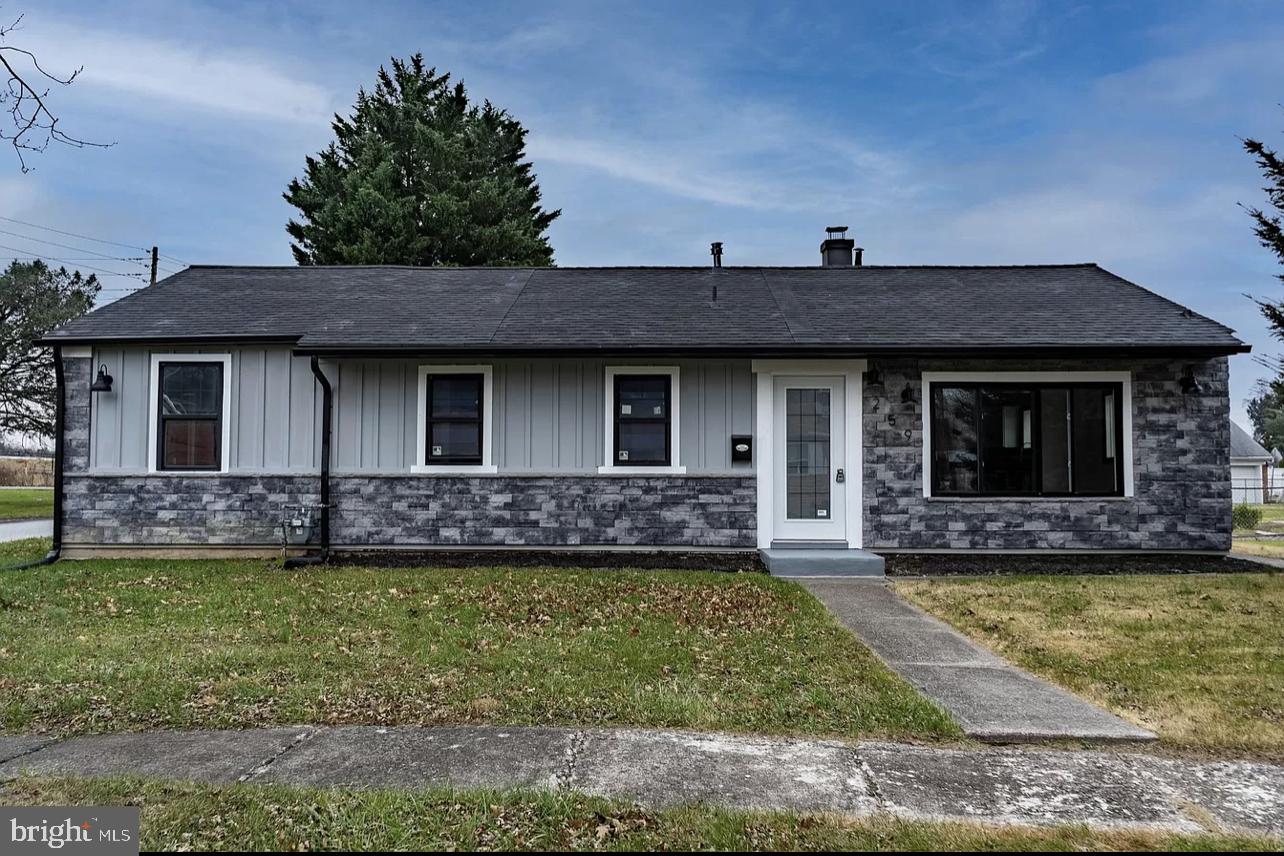Welcome to 259 Pinecrest Drive, a beautifully remodeled 3-bedroom, 2-bath home offering 1,357 square feet of stylish main-level living. As you step inside, you're greeted by luxury vinyl plank flooring, a stunning stone electric fireplace, and newer windows that fill the space with natural light. The eat-in kitchen impresses with white cabinetry, granite countertops, stainless steel appliances, and a vaulted ceiling. French doors off the kitchen lead to a bright sunroom, perfect for relaxing or entertaining, and a spacious laundry area featuring a newer Samsung washer and dryer. Step outside from the sunroom to a private patio—ideal for summer barbecues or soaking up the sun. Back inside, you’ll find three bright and airy bedrooms, each with newer carpet and remote-controlled ceiling fans. The owner’s suite is a true retreat with vaulted ceilings, double closets, and a beautifully updated bath featuring two vanities, a tiled shower, and an extra flex space for added functionality. The guest bath has also been tastefully remodeled with a sleek vanity and tile surround. Situated on a flat corner lot, the exterior includes a storage shed and plenty of room to enjoy the outdoors. Located just minutes from Wildwood Park and Nature Preserve, the scenic riverfront walking and biking trail, historic Fort Hunter, and downtown Harrisburg, this home offers both convenience and charm. Whether you are Entertaining in the Kitchen or BBQ'ing in the back yard- this is Home! Applicants must have a reasonable credit history, verifiable income of at least three times the monthly rent, and prior rental references. A minimum one-year lease is required. Credit and background checks are conducted. No smoking. Renter’s insurance is required. Tenants are responsible for electricity, gas heat, and water.