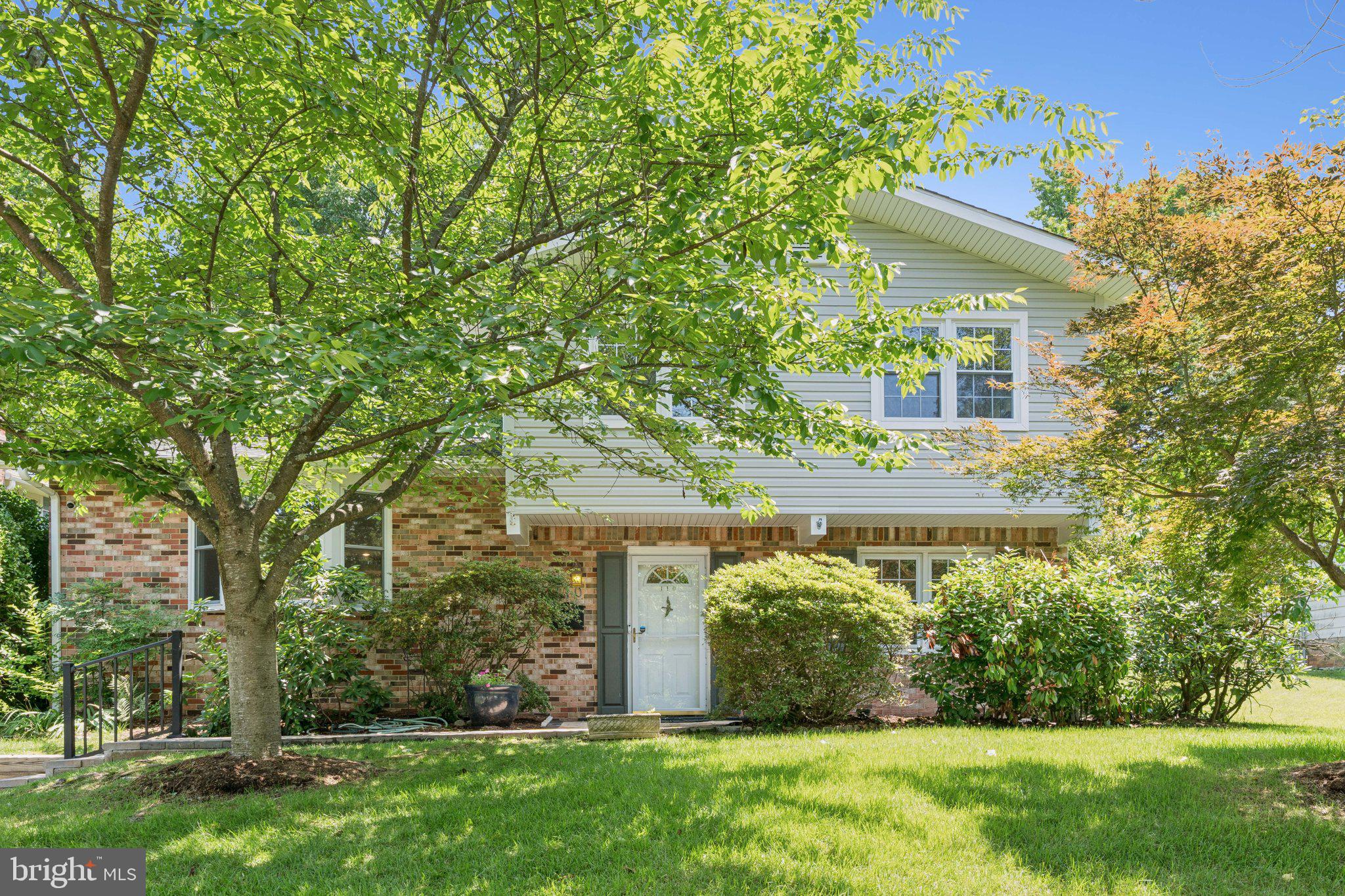 Spacious 6-bedroom, 2.5-bath split-level home in Greenbelt, MD, featuring versatile 6th bedroom—perfect as a guest room, home office, or playroom. The updated kitchen (2021) is a standout with stainless steel appliances, microwave and stove (2020), granite countertops, an island, ample cabinet storage and new hardwood floors. A stylish tile backsplash was added in 2023 for a modern touch.
Bathrooms were remodeled in 2021, and refinished hardwood floors run throughout the living, dining, and 3 out of 4 upstairs bedrooms. New LVP floors in family room (2024). Major system and structural upgrades include a new roof and siding (2022), water heater (2024), chimney rebuild, French drain, and sump pump (2023). Enjoy cozy winters by the gas fireplace (2020) and fresh air on the screened porch (2021). Outdoor improvements include patio and front pavers (2020).
Other key updates: new windows on main and second floors (2003) (with exception of upstairs front facing windows), indoor plumbing replaced (2003), and an electronic Carbon X air filter for winter use (2021). See disclosures for full list of improvements!
You'll love the beautifully maintained yard featuring a powered shed, screened-in patio, and a spacious covered patio—perfect for relaxing or entertaining guests. Old Greenbelt is known for walkability! Ideally located near parks and green space with Buddy Attick Lake a short walk away. Enjoy the convenience of a grocery store, restaurants, shops, doctors' offices, an arts center, farmer’s market, movie theater, community pool & fitness center, library, and sports fields, all less than a mile away through wooded pedestrian pathways. Metro bus and UMD shuttle stops at the end of the street, with the Greenbelt Metro Station only a few miles away.