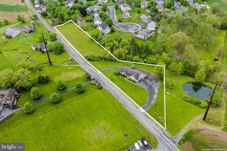 AUCTION PROPERTY.  AUCTION DATE- FRIDAY, June 12th @ 4PM.   Listed price is opening bid price only and is not indicative of the final sale price. Property must go to auction. TERMS:  10% down day of auction, balance 60 days or before.  Buyer pays both transfer taxes (2% of sale price).  REAL ESTATE: Stone/vinyl 1 story custom Rancher w/2060 SF plus 2000+ SF lower level, large eat-in kitchen w/appliances & custom panel maple cabinets, dining room, family/living room w/stone gas fireplace, 1st floor laundry, 3 bedrooms (master bedroom suite w/12x9 master bath & walk-in closet), 2½ baths, large daylight basement w/30x12 shop, office, future 31x27 rec room, utility room, storage room, gas forced heat, central AC, attached 2 car heated 28x28 garage, enclosed screened porch, patio & wrap-around deck all on level 2½ ACRES w/ plenty of lawn and garden area & circle driveway.  Zoned Rural Residential.  NOTE: Owners relocating & serious to sell. Spacious Rancher w/numerous upgrades & custom features.  Unique 2½ acre rural lot.  Minutes to Reinholds, Denver, Adamstown, Rt. 222 & Turnpike. OPEN HOUSE DATES: Saturday, May 23, 30 & June 6 from 1 to 4PM.