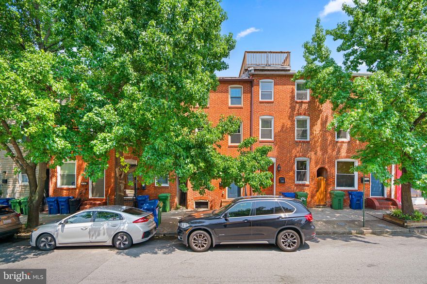 Location, location, location.  Hurry,, come check out this charming row home in the Canton community of Baltimore within walking distance to shopping, restaurants, and entertainment! This 4 level home is everything you need, featuring 3 large bedrooms and 2,5 remodeled bathrooms- main level and experience exposed brick, crown molding, and gorgeous hardwood floors and great lighting . Let the open concept and kitchen inspire your inner chef with subway tile backsplash, ample storage, stainless steel appliances, and granite counters. Relax and unwind in the spacious primary bedroom featuring plush carpet, and a sizable closet. 2 large bedrooms on the 2nd level and 1 large bedroom on top level.. Don't forget about entertaining in the backyard and rooftop with a fenced patio backyard and rooftop deck featuring fantastic views of the city and harbor! Major commuter routes include I-895, I-83, and I-95.