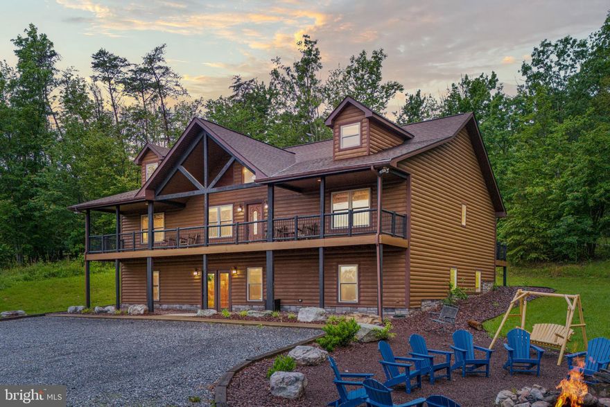 Incredible Investment Opportunity in the Blue Ridge Mountains – Proven Revenue Generator! Don't miss this exceptional opportunity to own a highly successful short-term rental property in the heart of the historic Shenandoah Valley. Located just minutes from downtown Luray, this beautifully maintained lodge has been a premier destination for travelers since 2009. Perfectly positioned near Luray Caverns, Shenandoah National Park, and the scenic Shenandoah River, the lodge offers year-round appeal to guests seeking adventure, relaxation, and mountain charm.

This spacious three-bedroom, three-bath mountain retreat features:
-Soaring vaulted ceilings in the family room
-A striking floor-to-ceiling stone fireplace
-Expansive wraparound deck for outdoor entertaining
-Modern entertainment area and updated furnishings
-Newly upgraded kitchen counters and appliances
-Fresh interior and exterior staining 
-landscaping and ongoing maintenance for optimal guest experience
-Easy access with no steep roads – ideal for all-season travel

The property is pet-friendly, features a hot tub, and continues to receive excellent guest reviews. For details, visit Airbnb and search: “Hot Tub, Pet Friendly, Luray Mountains!” Recent improvements (2022–2024) have further enhanced guest comfort and boosted rental income potential. This is a turnkey property with a solid track record! 

Not to mention, a property management team is in place to ensure a seamless transition, with numerous reservations already on the books for the year.

Qualified buyers are encouraged to request updated financial statements and details regarding existing easement agreements.