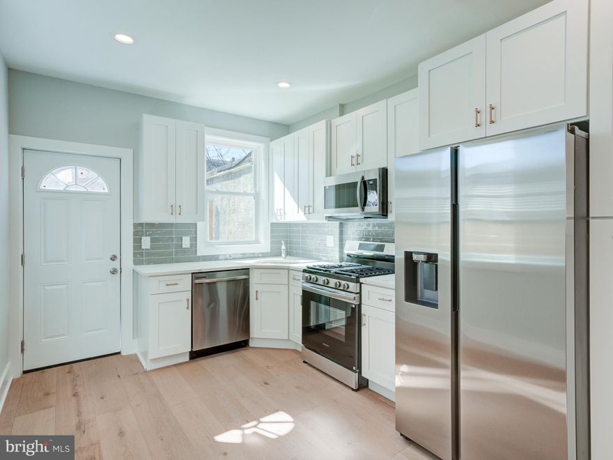 Fully rehabbed rowhome in the heart of Kensington featuring custom cabinetry, modern hardwood flooring, and a bright, open layout filled with natural light. The stylish kitchen offers sleek finishes and thoughtful design, while the updated bathroom showcases contemporary fixtures and clean lines. Step outside to enjoy a spacious backyard—perfect for entertaining, gardening, or relaxing. A great opportunity to own a move-in ready home with modern updates throughout.