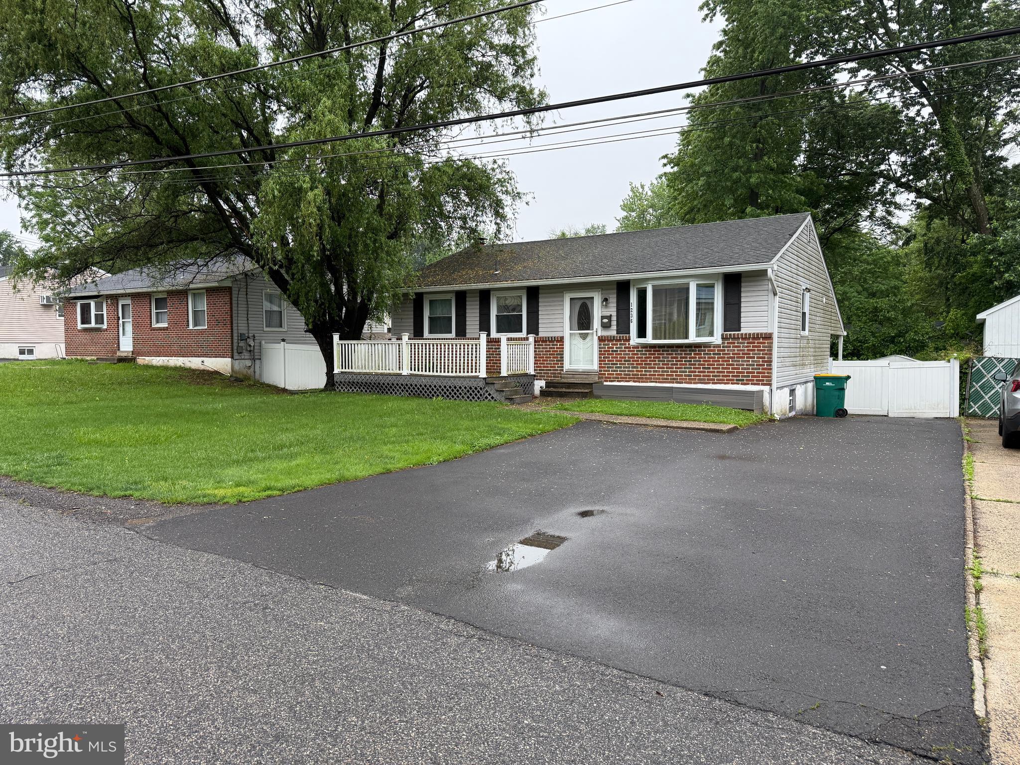 Welcome to our new listing in the heart of the Bensalem subdivision of Andalusia!
This beautiful home is situated on a wide yet quiet street, with minimal traffic—only local residents pass through. At the end of the street, this peaceful property offers a perfect retreat from the hustle and bustle.
The asphalt driveway is in excellent condition and spacious enough to accommodate at least three vehicles. The front of the house features a roomy deck, large enough for a six-person coffee table—ideal for relaxing mornings or evening gatherings.
Step inside and you'll find a bright and welcoming living room, seamlessly connected to the kitchen. The space is bathed in natural light, creating a warm and inviting atmosphere. The kitchen boasts natural wood cabinetry that pairs perfectly with sleek black appliances finished with stainless steel accents.
Also on the main floor is a full bathroom and two bedrooms. Originally designed with three bedrooms, the current layout combines two of them into one larger space by removing the partition wall. However, both original entry doors remain, making it easy and cost-effective to restore the third bedroom if desired.
High-quality laminate flooring extends throughout the first floor, with cozy carpeting in the bedrooms. Access to the basement is through the kitchen. Downstairs, you’ll discover a spacious family room with a natural wood fireplace—perfect for relaxing or entertaining. The basement also features several additional rooms, including one set up as an extra bedroom, a utility room with ample storage, and a dedicated laundry area.
From the kitchen, step into a large sunroom that overlooks the expansive backyard—an ideal space for lively gatherings with friends or quiet family time. The backyard is flat and rectangular, free of rocks, uneven terrain, or drainage issues. In the far right corner sits a generous shed, and a gate opposite the shed allows for vehicle access right up to it.
This home offers the rare combination of a peaceful setting with easy access to major highways and local amenities—without any noise pollution.
Don’t miss your chance to view this unique property. Schedule your showing today—this one won’t last long!