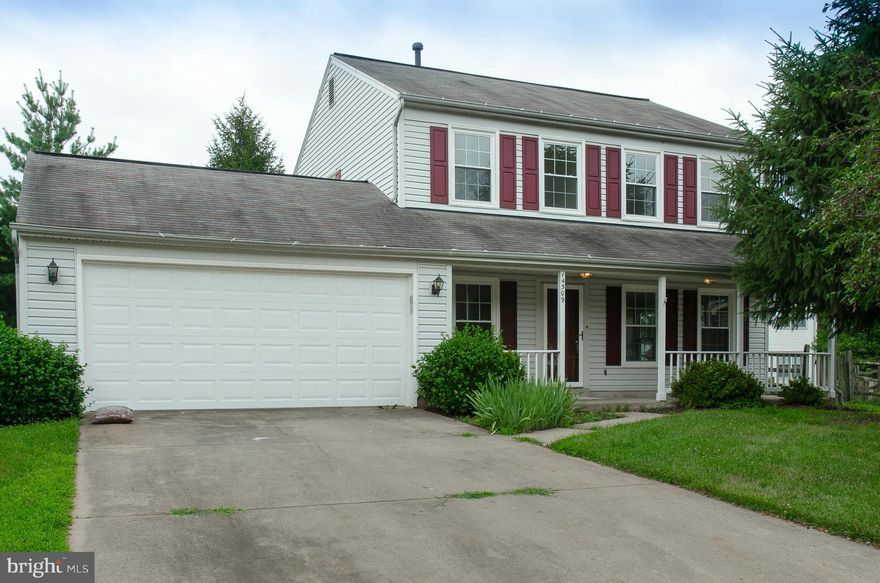 Back on market due to buyers financing! COLONIAL W/ COUNTRY FRONT PORCH & 2 CAR GARAGE ON LARGE LEVELFENCED YARD!! LOVELY ENTRANCE FOYER W/ SEP LIV.RM. & FORMAL DINING RM. BRIGHT, SUNNY KITCHEN W/SPACE FOR LARGE TABLE OPENS TO FAMILY RM W/ FIRE- PLACE & CATHEDRAL CEIL W/ SKYLIGHTS. 3 NICE BEDRMS UPSTAIRS W/ 2 FULL BATHS!**GAS COOKING, HEAT & HOT Water**NEW CARPET, PAINT & TILE.