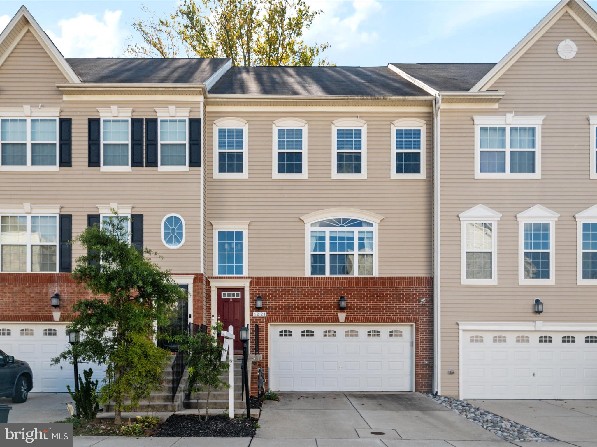 Welcome to this exquisite four-level townhome in Summerfield Village. This "Arlington" model, the largest elevation available and 1 of only 12 in the neighborhood like it, has approximately 3,600 square feet of meticulously designed living space. It offers three generous bedrooms and three full and two half baths.
The open-concept gourmet kitchen is a chef's dream, featuring stainless steel Electrolux appliances, a large center island, and a stove vent. Entertain with ease thanks to the LeGrande in-ceiling sound system on each floor and a five-speaker surround sound system in the living room, complete with a Klipsch Subwoofer and Yamaha speaker. Outlets and Ethernet ports are conveniently located on every level.
The primary suite on the 3rd floor offers a tranquil retreat with a sitting area, a luxurious dual-head shower, and a walk-in closet. Ascend to the gorgeous fourth level, a versatile space perfect for an office or music studio, complete with a half bath, wet bar with a mini-fridge, and a second green energy HVAC system for optimal airflow. Two doors lead out to the private rooftop patio, ideal for relaxation or entertaining.
The finished garage features an epoxy floor and a Lift-Master garage door opener. This home also includes a full basement with 656 finished square feet.
Community amenities abound, including two playgrounds, a dog park, and walking trails, with a clubhouse for residents to enjoy. With easy access to major commuter routes and MARC, and a walking trail just around the corner to restaurants and shops, this is a must-see property!