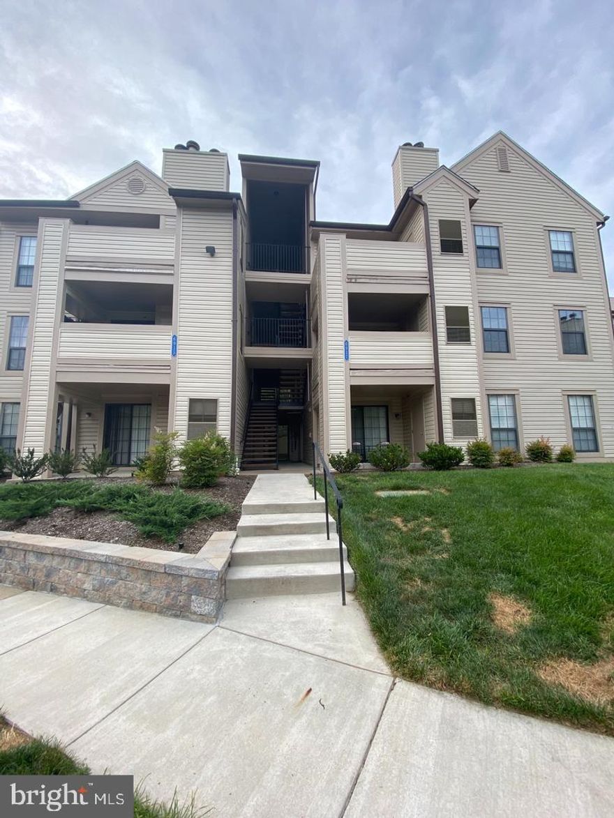 Warm and inviting ** 2 bed 2 full bath ** Partially furnished and move in ready ** Stainless appliances ** Laundry in unit ** Updated light fixtures ** Updated flooring in kitchen and bathrooms ** Separate Dining Room ** Private balcony ** Lots of natural light ** Close to restaurants and night life ** Short drive to major commuter routes and Blue/Yellow Line Metro stop.