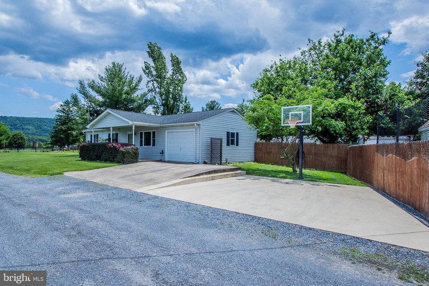 Country living at it's best, impeccably kept 3 bedroom rancher, 1 car garage, upgraded kitchen, granite countertops, stainless appliances, eat-in dining area, living room, full basement quazi finished  with laundry area. Fenced back yard, large open side yard with plenty of room for outdoor activities, many footballs have been passed and caught over the years. Chicken coop with chickens (can convey, free eggs every day!), a garden ready to be tilled(tiller can convey) and sowed  with your favorite vegetables, a shed, basketball court complete this home.