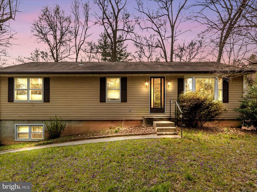 Charming 3-bedroom, 2-bath rancher nestled in Beltsville on an expansive lot spanning over an acre! This delightful home boasts a walkout basement, partially finished and equipped with a rough-in for an additional bathroom. Revel in the comfort of a brand-new roof, upgraded gutters, and a freshly constructed deck outdoors  in a very private setting.. Embrace the spaciousness of this property and make it your ideal retreat.