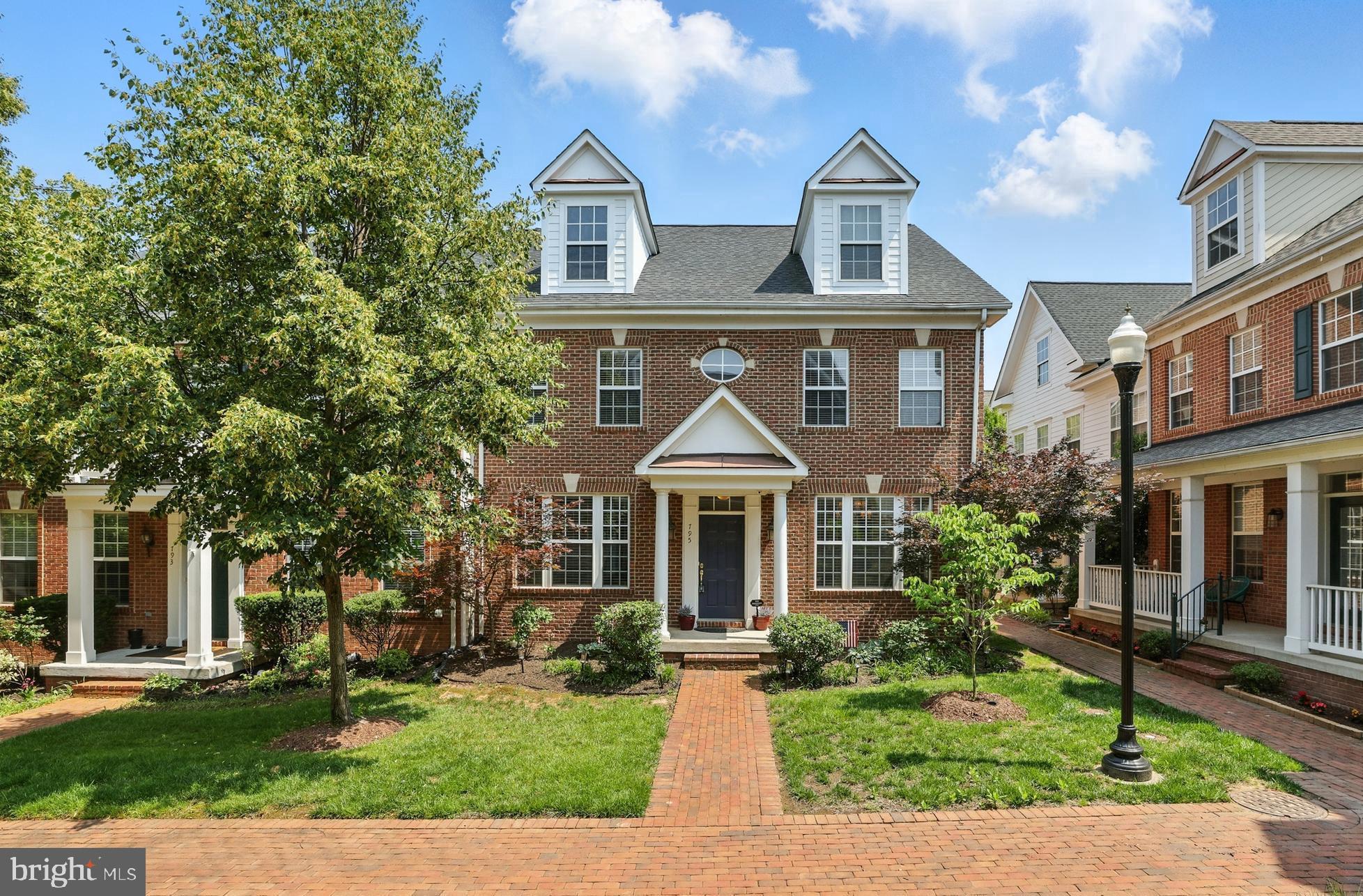 **Ask about the 4.625% VA Assumable Loan** Welcome home to Belmont Bay! Ideally positioned in a preeminent location in one of the most sought-after waterfront communities in Northern Virginia, this exquisite end-unit colonial townhome offers luxurious, refined living on all three spacious and light-filled levels. Inside, gorgeous hardwood floors flow seamlessly throughout the main level, where the elegant formal living and dining rooms are framed by classic columns and detailed with sophisticated crown and chair rail molding. At the heart of the home, the chef’s kitchen is both stylish and functional, showcasing a beautiful tray ceiling with modern recessed lighting, sleek quartz countertops, and modern stainless steel appliances. The breakfast bar opens into the inviting family room where you’ll enjoy getting cozy by the gas fireplace. Upstairs, the lavish primary bedroom suite is a true retreat, boasting a spacious private sitting room and dual walk-in closets. Inside the spectacular en suite bathroom you’ll find a dramatic vaulted ceiling, two separate vanities, and a soothing soaking tub in addition to the step-in shower. Both additional generously-sized bedrooms include soft carpeted floors and ample closet space, with shared access to the second full bathroom in the hallway. For the height of convenience, the large laundry room is located on the bedroom level and includes a utility sink. On the top level of the home, the versatile bonus loft boasts handsome built-in shelving and offers great potential as a home office or additional lounge area. The fourth bedroom and third full bathroom on this private level provide you with an ideal space for in-laws, a live-in nanny, or guests. Outside, enjoy the serenity and privacy of your fenced brick patio as you enjoy your morning coffee or al fresco dining. The rear-loading two-car garage provides you with plenty of space for both storage and parking, tucked nearly behind the home for added curb appeal. Residents of Belmont Bay enjoy an unparalleled lifestyle, with access to a full suite of amenities including a picturesque marina with boating access, tennis and basketball courts, an outdoor pool, scenic trails, and beautifully maintained common spaces. All of this, just minutes to Wegmans, Aldi, Walmart, Stonebridge at Potomac Town Center, Potomac Mills, Veterans Memorial Park, Occoquan Bay National Wildlife Refuge, Mason Neck State Park, and the charming shops and restaurants of Historic Occoquan. Nature lovers will appreciate the proximity to Occoquan Bay National Wildlife Refuge and Mason Neck State Park, while commuters will enjoy seamless access to Route 1, I-95, Prince William Parkway, and Ox Road, and the nearby VRE Woodbridge station - just one mile away. for easy commuting. This is more than just a home-it’s a lifestyle. Don’t miss this opportunity to own one of Belmont Bay’s finest residences! Schedule a private tour of your gorgeous new home today!