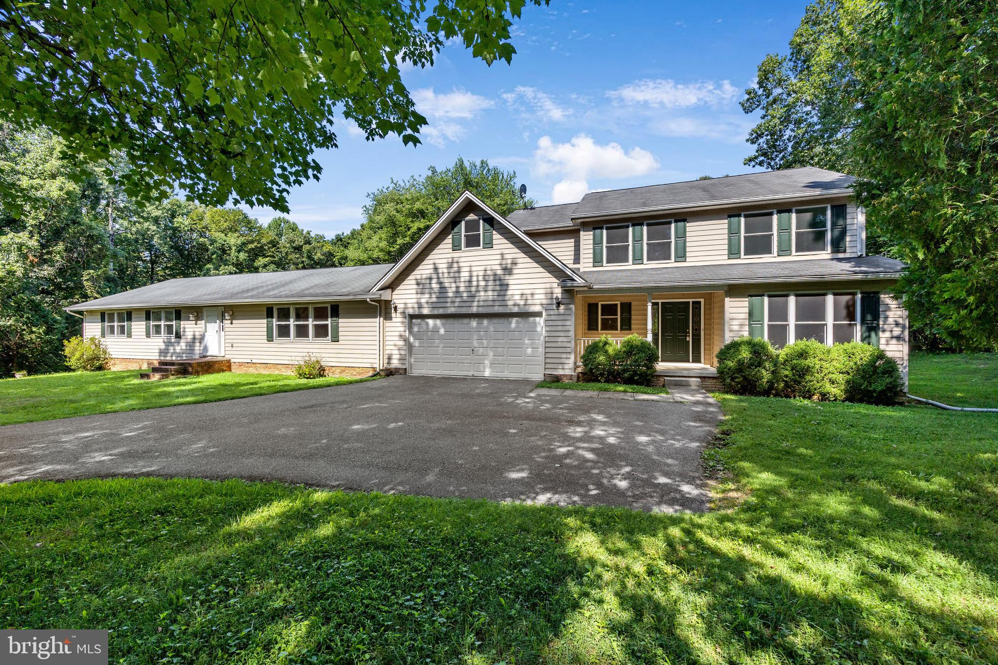 Versatile Property with Endless Possibilities!
This one-of-a-kind property offers two attached residences connected by a shared garage, providing exceptional flexibility for a variety of uses. With a total of 7 bedrooms and 4.5 bathrooms, there’s abundant space for comfortable living, hosting guests, or creating an income-producing arrangement.
Set on a spacious, flat lot backing to woods, the property offers both privacy and a peaceful setting. A large paved parking area provides plenty of room for multiple vehicles, recreation, or even a basketball hoop.
One residence includes a finished basement with a full bath, while the other boasts a massive enclosed terrace—perfect for year-round enjoyment. Both residences also feature outdoor sheds for additional storage.
The two-story home showcases beautiful hardwood floors, custom built-in cabinetry in the kitchen, a separate dining room, and the convenience of a half bath and laundry on the main level. It also features a dual-zone HVAC system for optimal comfort and a two-story primary suite with an expanded closet.
Whether you’re seeking a distinctive primary residence with added living space or a smart income-generating setup, this property delivers. Don’t miss your chance to own this rare and versatile retreat—schedule your showing today!