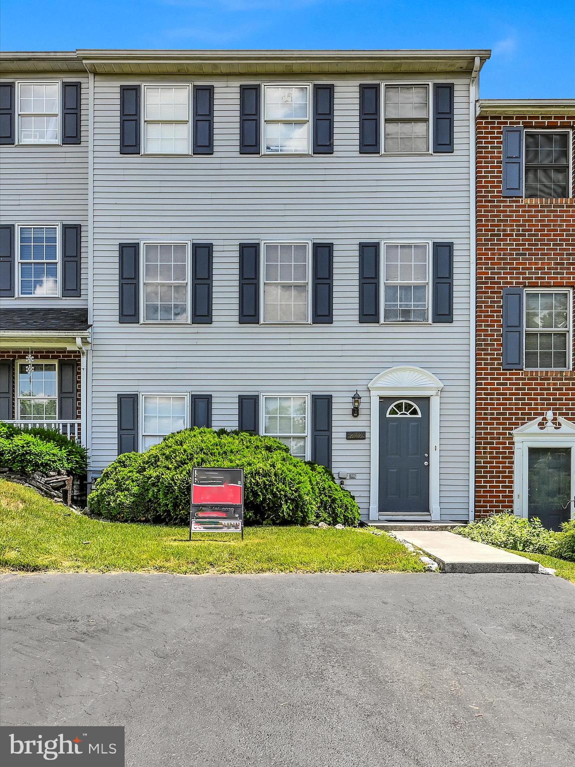 OPEN HOUSE SCHEDULED FOR SATURDAY, JUNE 8TH FROM 11:00-2:00. COME VIEW IT AND BRING YOUR STRONGEST AND BEST OFFER BY SUNDAY, JUNE 9TH AT 2:00. Calling all investors and bargain hunters! Build your investment portfolio or pay yourself through sweat equity! This spacious townhome needs some updating, repairs, and overall TLC. It provides an affordable opportunity to add your touches to your own home. 2-3 bedrooms and 1 1/2 baths with laundry hook-ups. No more going to the laundromat! Current refrigerator, range, and dishwasher included. Newer hot water heater. Great views from the deck.  Convenient location to Rte. 30 & I83. Central School District. Home is on a cul-de-sac and provides abundant on and off street parking. Property being sold AS IS, seller will do no repairs. Please do not disturb tenants unless you have scheduled a showing. Don't let the cat out.