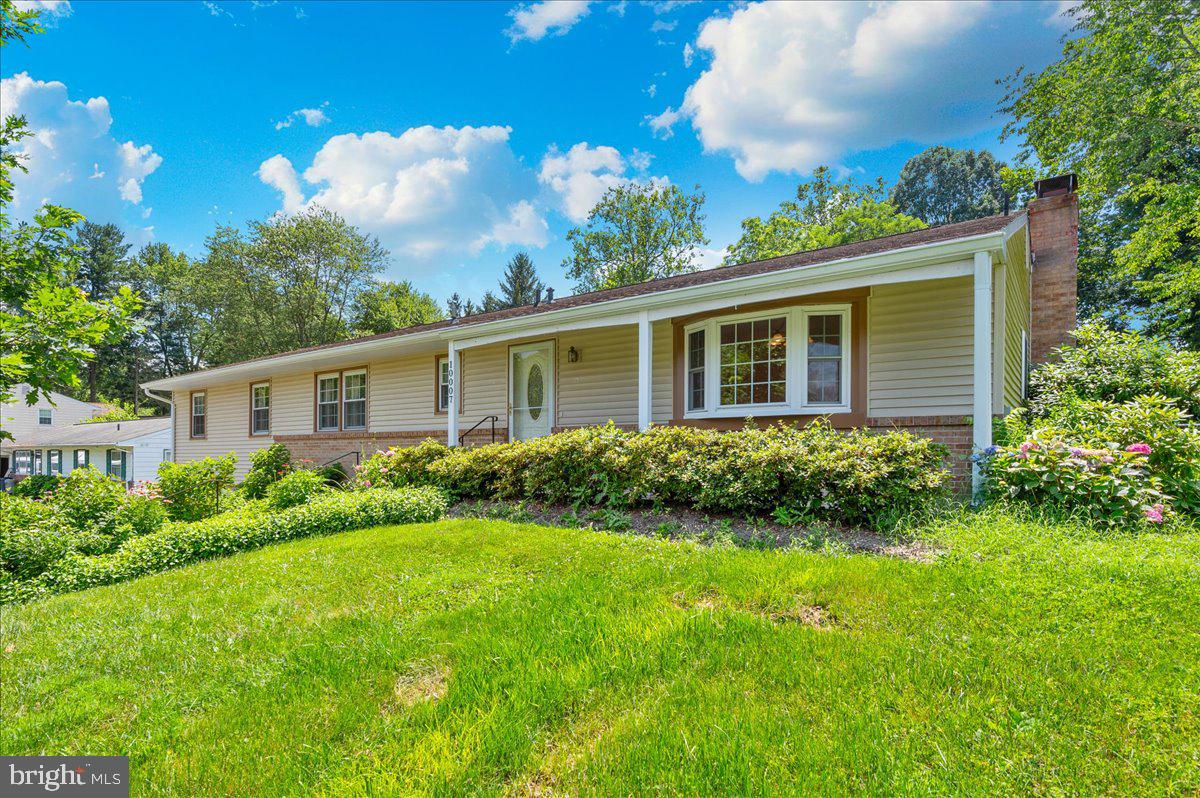 Don’t miss out on this spacious 5-bedroom, 3 full bathroom rancher in a great commuter location only minutes to I-270. The breezy front porch and colorful front yard landscaping welcomes you. The beautiful gourmet galley kitchen was renovated in 2021 and offers cherry cabinetry, quartz/resin countertops, gas cooking, a custom pantry, and ceramic tile flooring. Grow fresh herbs in the kitchen garden window. All appliances convey including a standalone freezer. Hardwood floors run throughout much of the main level. The sliding glass doors in the living room lead to a brick patio and big fenced backyard. The large primary bedroom has an en-suite bath with shower. The remaining four bedrooms are all very spacious. There’s also an oversized two car garage with a connecting oversized workshop. The huge basement family room will need some updating and provided wonderful additional living space. The home has an active radon system in place too. This great property won't last!
