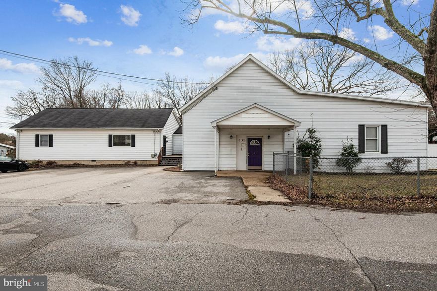 Perfect OPPORTUNITY for an investor looking to build a future multifamily unit (zone 5) in Glen Burnie. Combination Space with large main building previously used as a daycare, and an attached residential living space, perfect for use as a rental home. The main building features bright, natural lighting, three main open spaces, and four convenient entry/exit doors. Also features a mix of tile flooring and carpeting, florescent lighting, and walls of built in cubby shelving, as well as built in open locker spaces. Walls are sturdy exposed concrete. The large bathroom in the main building features a multiple sink vanity and a half stall. The kitchen features plenty of white cabinetry, wall oven, stovetop with above range hood, and fridge. Also features double sink with window view and cooling ceiling fan. Fully fenced in yard has majestic trees, wide open spaces, and a traditional style playground. Three ductless vents provide central air and heating. **RESIDENTIAL SPACE** The residential space features stunning cathedral ceiling with skylights, new flooring and carpeting, and plenty of track lighting throughout. Main floor includes two bedrooms with ceiling fans, one full bathroom, and open living space layout with living/dining/kitchen. The kitchen features plenty of counter and cabinet space, breakfast bar, and a double door fridge with ice maker. Enjoy everyday meals in the neighboring dining room with easy access to the sliding glass doors leading to the wooden deck. Spacious open deck overlooking the lot is a great place to set up outdoor eating for a summertime event! Easy parking courtesy of the wide concrete lot. Minutes way from Arundel Expressway, I-97, and other major highways. Minutes away from Baltimore/Washington International Airport and walking distance to Marley Creek. Do not miss this one!