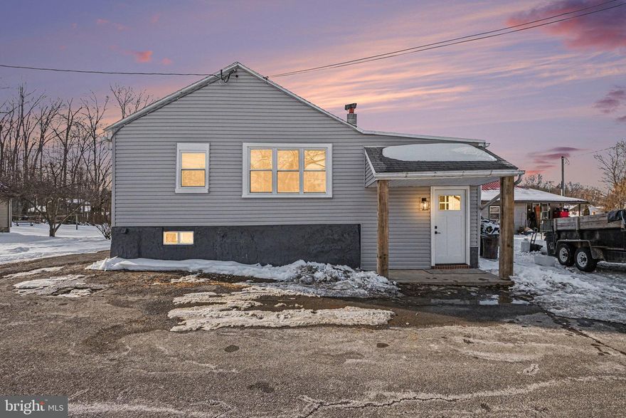 Welcome to 7 Groy Ave, a fully renovated detached home that blends modern upgrades with warm, cottage-style charm. This property offers off street parking and a private yard, with every major mechanical thoughtfully updated, including new plumbing, electrical, windows, and a high efficiency heat pump with central air.
Inside, you’re welcomed by a spacious foyer, perfect for coats and shoes, setting the tone for a home that feels both functional and inviting. The show stopping vaulted ceiling features pine board detail and beautifully stained original wood beams, creating a cozy yet elevated atmosphere.
The kitchen is a true highlight, featuring solid hardwood cabinets, custom butcher block countertops, and matching custom butcher block floating shelves, delivering a warm, handcrafted cottage feel with plenty of storage and prep space. Luxury vinyl flooring flows throughout the home, complemented by plush carpeting in the bedrooms, and the home offers two full bathrooms. Thoughtful wood accents and custom details are showcased throughout, making every space feel intentional.
Step outside to a massive rear deck currently being built, ideal for entertaining, cookouts, morning coffee, or quiet evenings. The exterior is finished with handcrafted rough cut wood front porch posts, adding standout curb appeal, along with the convenience of off street parking. This home feels like a private getaway, one you’ll be proud to call your own.