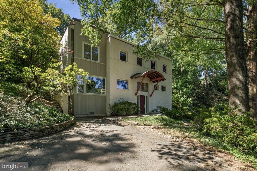 Welcome to your one-of-a-kind North Arlington Bauhaus-inspired home! Ideally located on a quiet street just a couple of stoplights from DC, minutes from Cherrydale retail, metro + Ballston Quarter, and convenient to major commuter routes, 2248 N Quebec beckons with a large, tree-filled yard and an inviting stone patio. Inside, you'll enjoy a stunning set of windows in the open-concept living and family area right off a kitchen with custom countertops + cabinets plus stainless steel appliances. A main level bedroom adds convenience. The entire home has been painted, gutters are new, and the main level and primary baths have been updated. There is also new carpet upstairs, and three light-filled bedrooms. Don't miss out on this home - schedule a tour today!