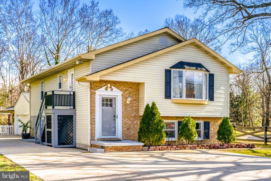 Beautiful 4 Bed, 3 Bath Single-Family Home in the Heart of Rosedale! Welcome to your dream home! Step through the front door into an open foyer that leads to a bright, expansive floor plan with stunning hardwood floors throughout. Natural light floods every room, highlighting the spacious living dining combo and large eat-in kitchen, complete with a breakfast bar, granite countertops, white cabinetry, stainless steel appliances, and recessed lighting. Down the hall, the master bedroom features dual closets, accompanied by two additional generously sized bedrooms and a beautifully finished full bath with custom tile work, perfect for comfortable everyday living. The lower level offers incredible versatility and can function as an in-law suite. It features a living dining area with luxury vinyl plank flooring, a bedroom with abundant natural light, and a bonus room ideal for a fifth bedroom, office, or playroom. A full bath with walk-in shower and a fully equipped eat-in kitchen with breakfast bar, stainless steel appliances, and laundry area complete this space. Wait until you see the oversized 2-car garage! Currently used as a full gym with a wood-burning fireplace/buck stove, it also includes three attached rooms perfect for storage, an outdoor kitchen, or workspace. Step outside to your private oasis, a stunning patio with an oversized gazebo, firepit, outdoor grill, and lighting, ideal for entertaining. With Spring and Summer around the corner, enjoy cool evenings around the firepit and create lasting memories with family and friends. There’s even a kids’ play area! No need to worry about parking, with a long driveway accommodating 8-10 vehicles. This home truly has it all: space, style, and endless possibilities. Close to major routes, shopping, and dining! So, schedule your tour, fall in love, and make 7803 Riverdale Ave your new Home Sweet Home!